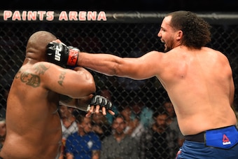 PITTSBURGH, PA - SEPTEMBER 16:  (R-L) Justin Ledet punches Zu Anyanwu in their heavyweight bout during the UFC Fight Night event inside the PPG Paints Arena on September 16, 2017 in Pittsburgh, Pennsylvania. (Photo by Josh Hedges/Zuffa LLC/Zuffa LLC via G