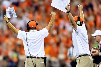 CLEMSON, SC - SEPTEMBER 09:  Head coach Dabo Swinney of the Clemson Tigers raises his arms in a 'v' during the closing minutes of the Tigers' football game against the Auburn Tigersat Memorial Stadium on September 9, 2017 in Clemson, South Carolina. (Phot