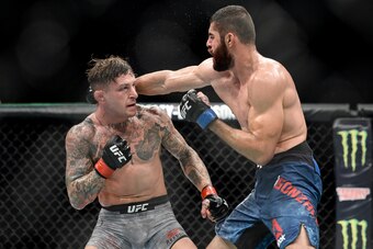 PITTSBURGH, PA - SEPTEMBER 16:  (R-L) Jason Gonzalez punches Gregor Gillespie in their lightweight bout during the UFC Fight Night event inside the PPG Paints Arena on September 16, 2017 in Pittsburgh, Pennsylvania. (Photo by Brandon Magnus/Zuffa LLC/Zuff