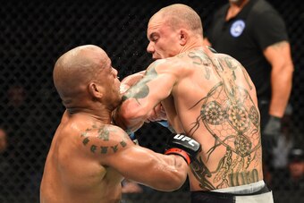 PITTSBURGH, PA - SEPTEMBER 16:  (R-L) Anthony Smith lands an elbow against Hector Lombard of Cuba in their middleweight bout during the UFC Fight Night event inside the PPG Paints Arena on September 16, 2017 in Pittsburgh, Pennsylvania. (Photo by Josh Hed