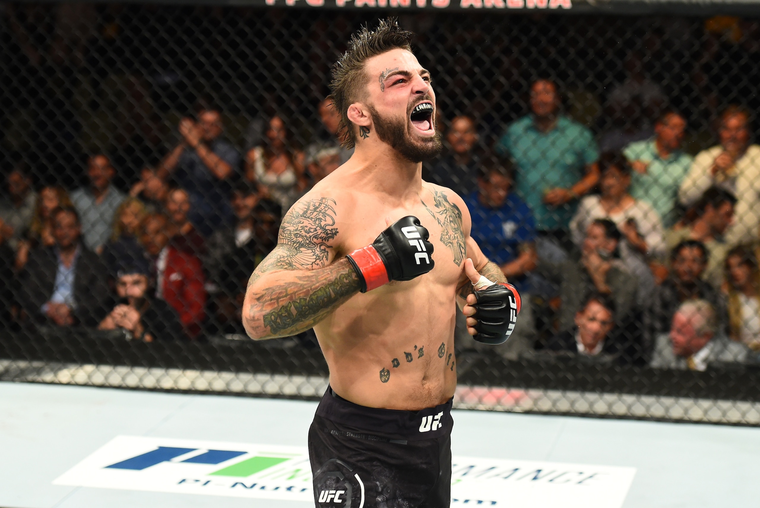 PITTSBURGH, PA - SEPTEMBER 16:  Mike Perry celebrates after defeating Alex Reyes in their welterweight bout during the UFC Fight Night event inside the PPG Paints Arena on September 16, 2017 in Pittsburgh, Pennsylvania. (Photo by Josh Hedges/Zuffa LLC/Zuf