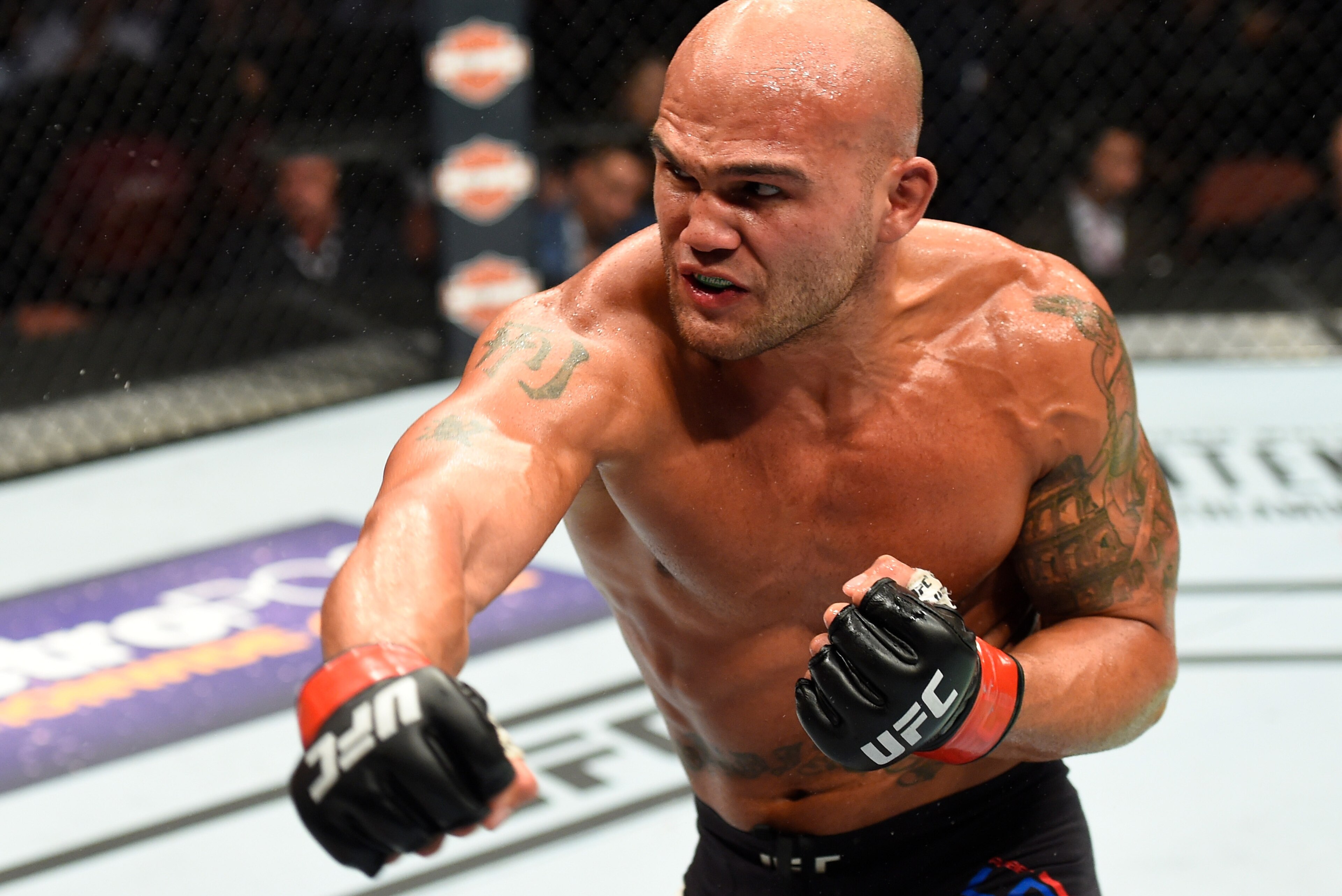ANAHEIM, CA - JULY 29:  (R-L) Robbie Lawler punches  Donald Cerrone in their welterweight bout during the UFC 214 event inside the Honda Center on July 29, 2017 in Anaheim, California. (Photo by Josh Hedges/Zuffa LLC/Zuffa LLC via Getty Images)