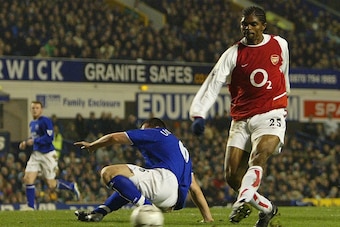 LIVERPOOL, ENGLAND - JANUARY 7:  Kanu of Arsenal scores the opening goal during the FA Barclaycard Premiership match between Everton and Arsenal at Goodison Park on January 7, 2004 in Liverpool, England.  (Photo by Clive Mason/Getty Images)
