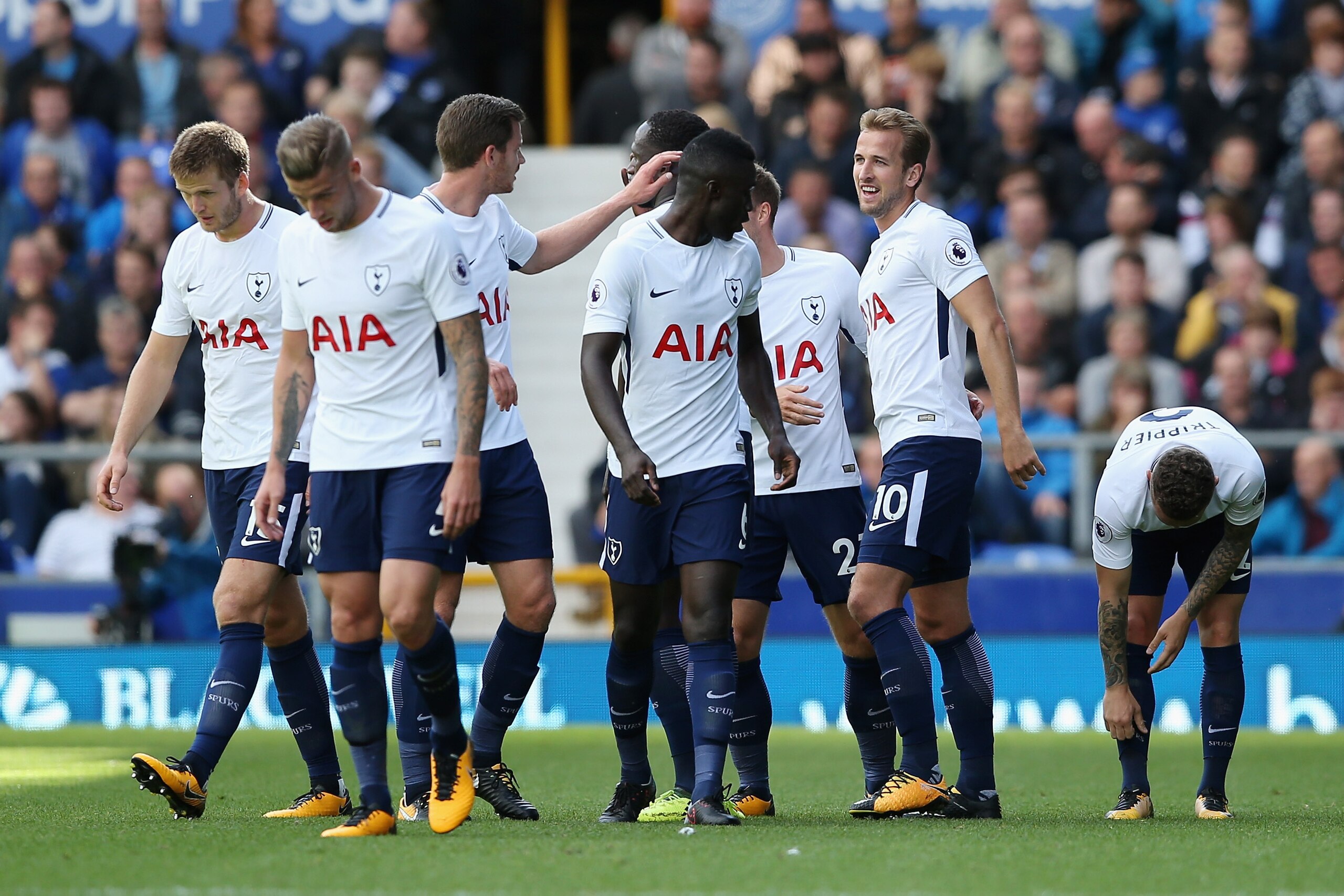 LIVERPOOL, ENGLAND - SEPTEMBER 09: Christian Eriksen of Tottenham Hotspur (obscure) celebrates scoring his sides second goal with his Tottenham Hotspur team mates during the Premier League match between Everton and Tottenham Hotspur at Goodison Park on Se