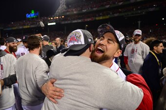 BOSTON, MA - OCTOBER 30: Jacoby Ellsbury #2  of the Boston Red Sox hugs Daniel Nava #29 while celebrating after winning  the World Series against the St. Louis Cardinals on  October 30, 2013 at Fenway Park in Boston, Massachusetts. (Photo by Michael Ivins