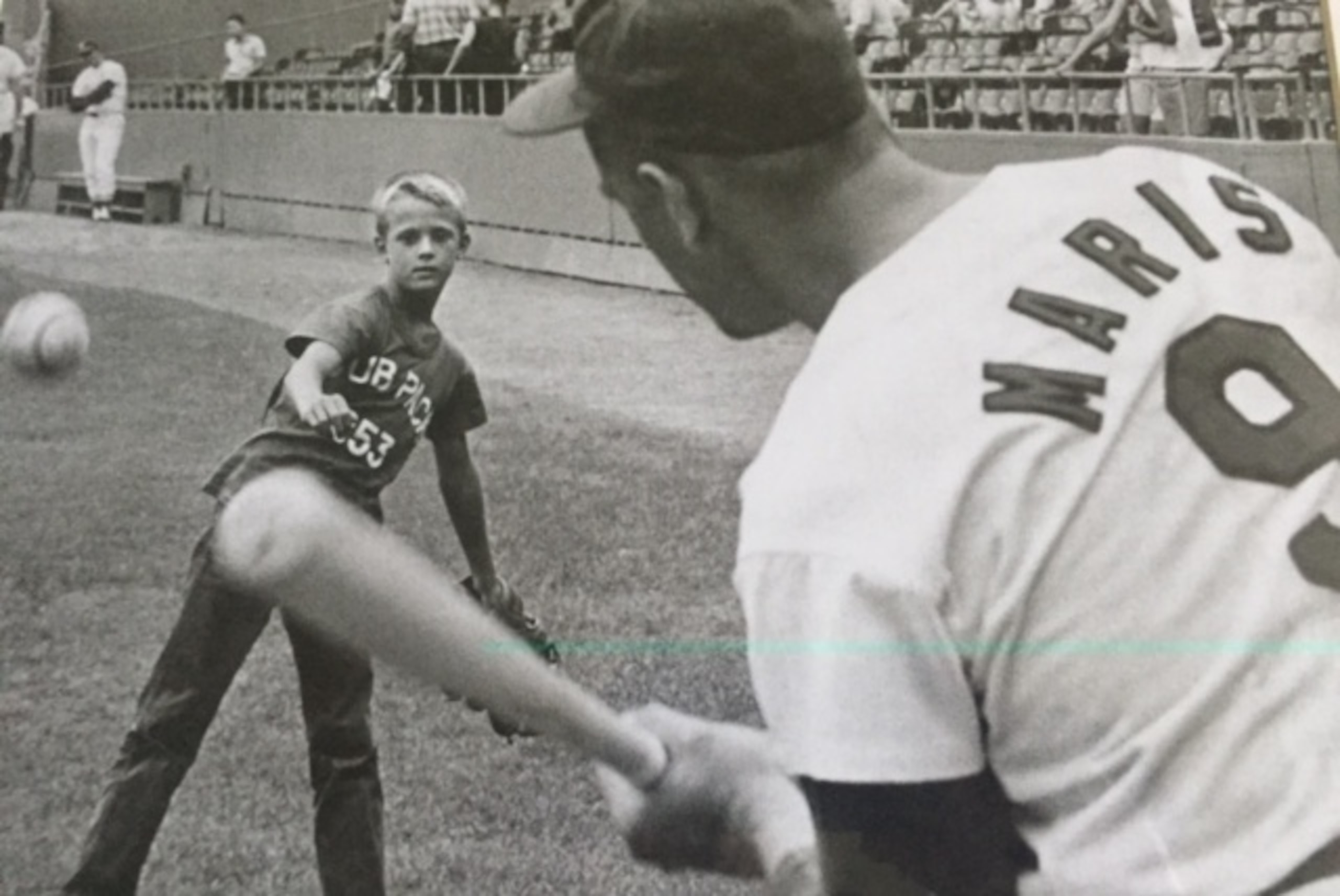 Roger Jr. playing a game of pepper with his father, Roger Maris.