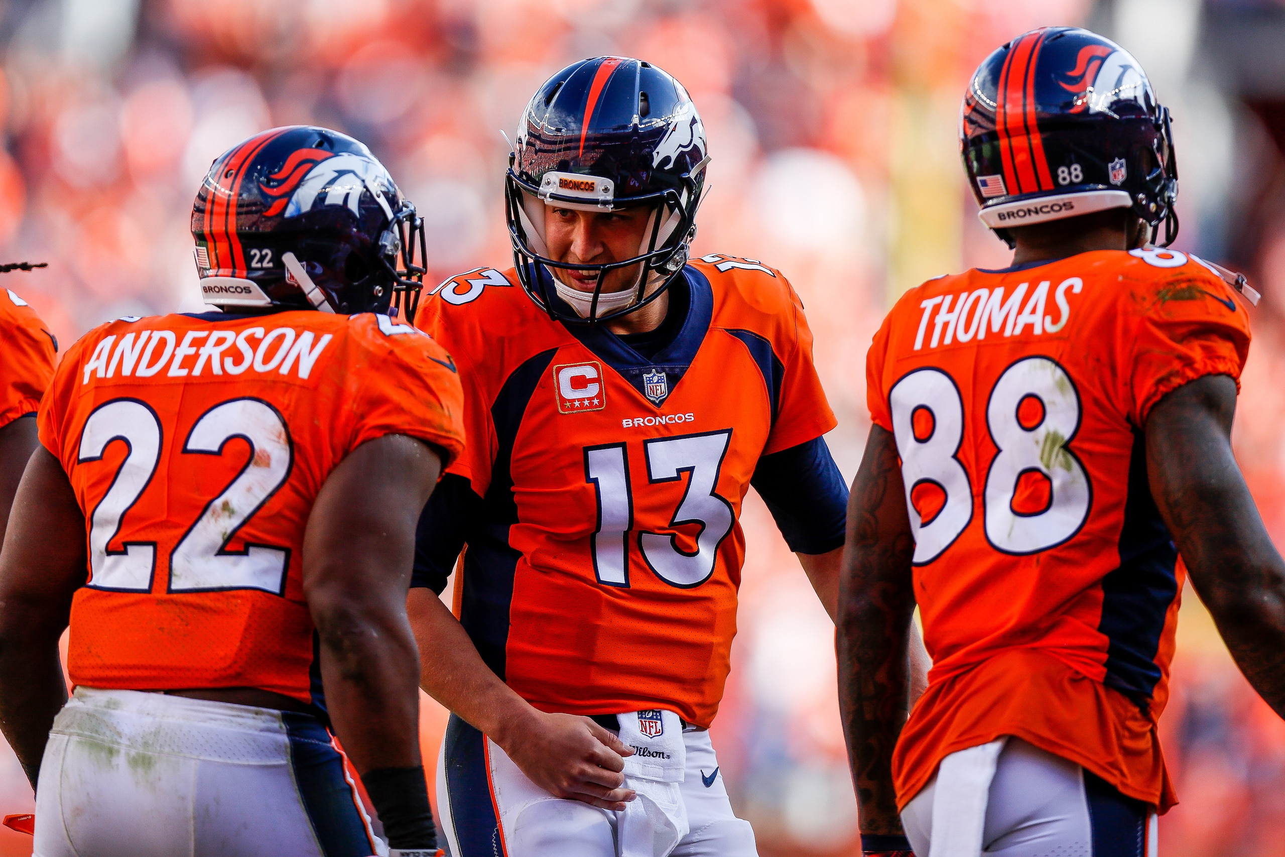 DENVER, CO - SEPTEMBER 17: Running back C.J. Anderson #22 of the Denver Broncos celebrates with quarterback Trevor Siemian #13 after a catch and run touchdown play in the second quarter of a game at Sports Authority Field at Mile High on September 17, 20 DENVER, CO - SEPTEMBER 17: Running back C.J. Anderson #22 of the Denver Broncos celebrates with quarterback Trevor Siemian #13 after a catch and run touchdown play in the second quarter of a game at Sports Authority Field at Mile High on September 17, 20