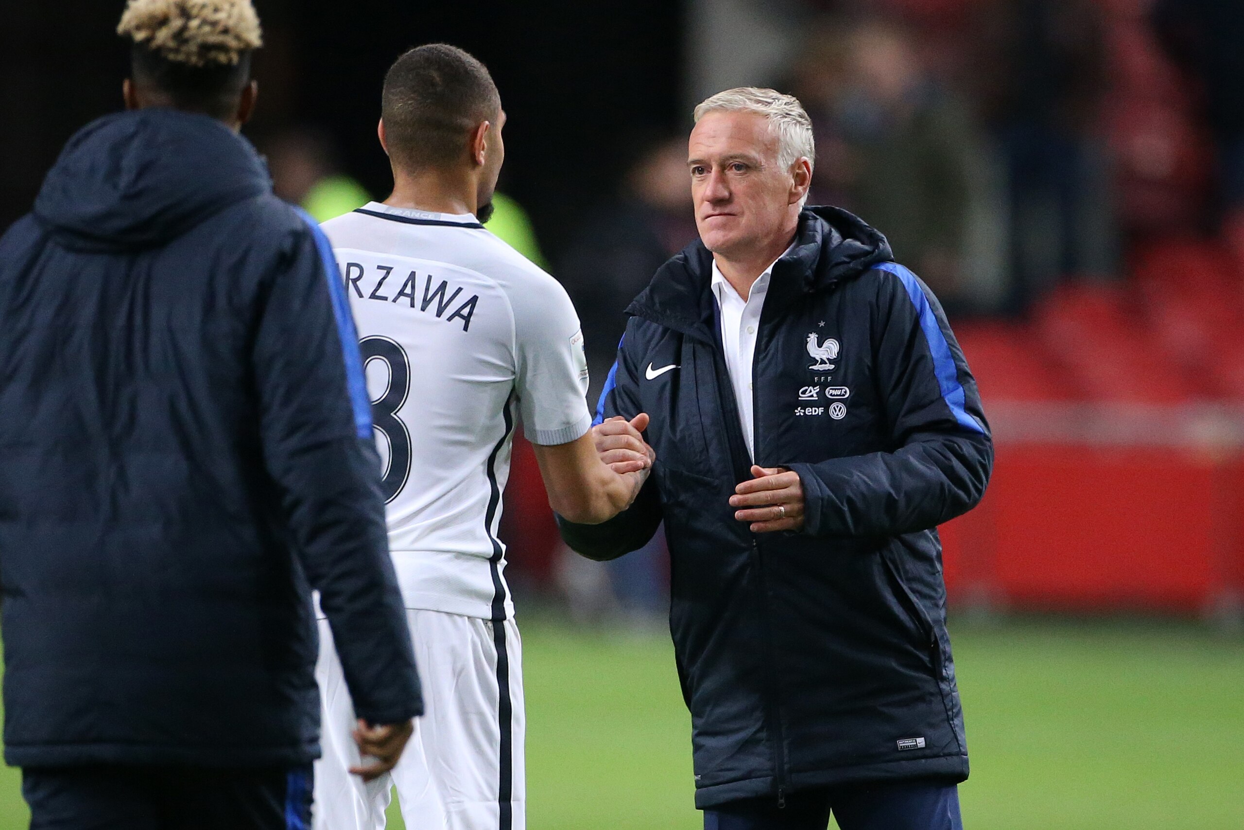 AMSTERDAM, NETHERLANDS - OCTOBER 10: Coach of France Didier Deschamps greets Layvin Kurzawa following the FIFA 2018 World Cup Qualifier between The Netherlands and France at Amsterdam ArenA on October 10, 2016 in Amsterdam, Netherlands. (Photo by Jean Cat