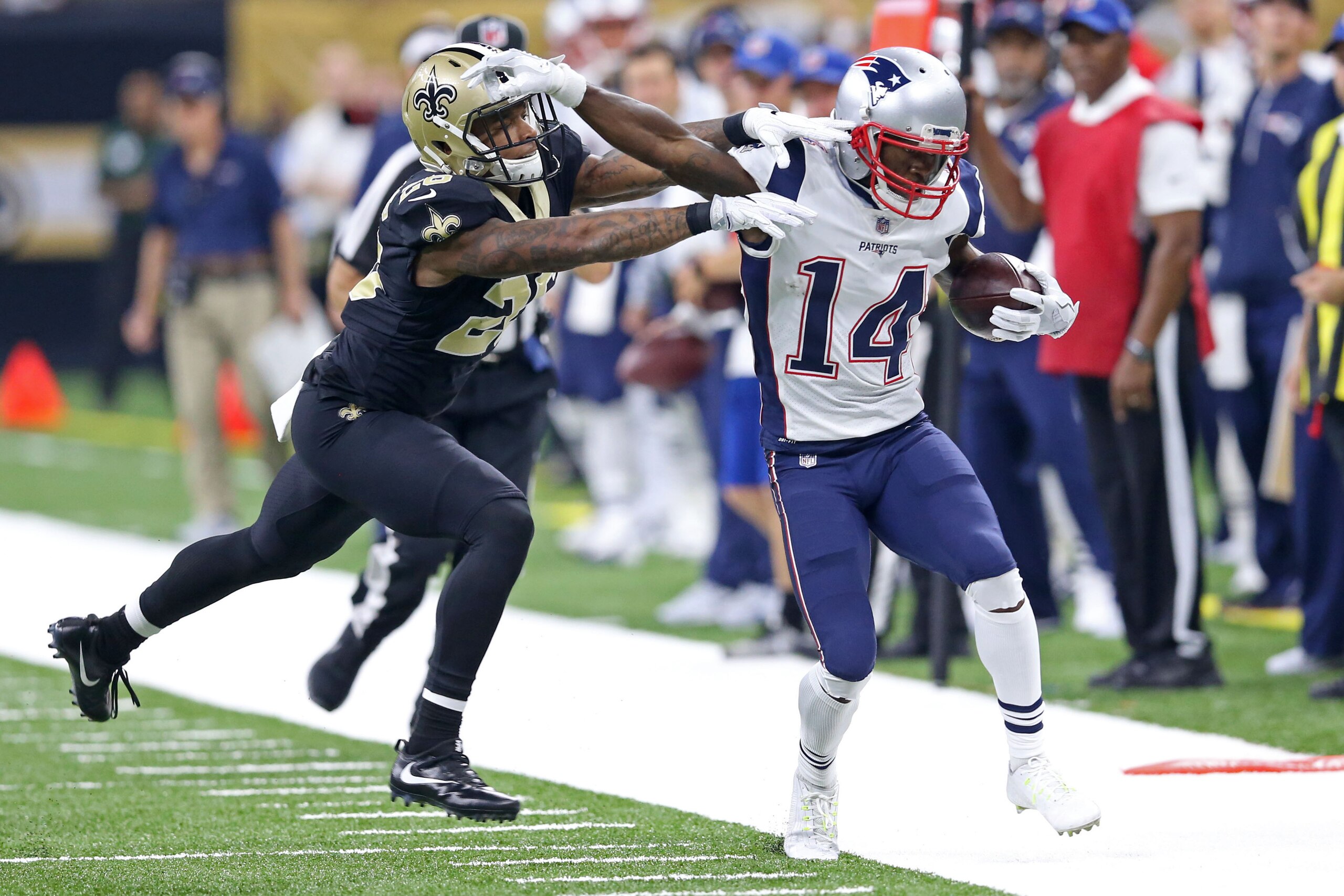 Sep 17, 2017; New Orleans, LA, USA; New Orleans Saints cornerback P.J. Williams (26) knocks New England Patriots wide receiver Brandin Cooks (14) out of bounds after a catch in the first quarter at the Mercedes-Benz Superdome. Mandatory Credit: Chuck Cook