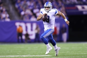 EAST RUTHERFORD, NJ - SEPTEMBER 18:  Matthew Stafford #9 of the Detroit Lions runs with the ball against the New York Giants in the first quarter during their game at MetLife Stadium on September 18, 2017 in East Rutherford, New Jersey.  (Photo by Elsa/Ge