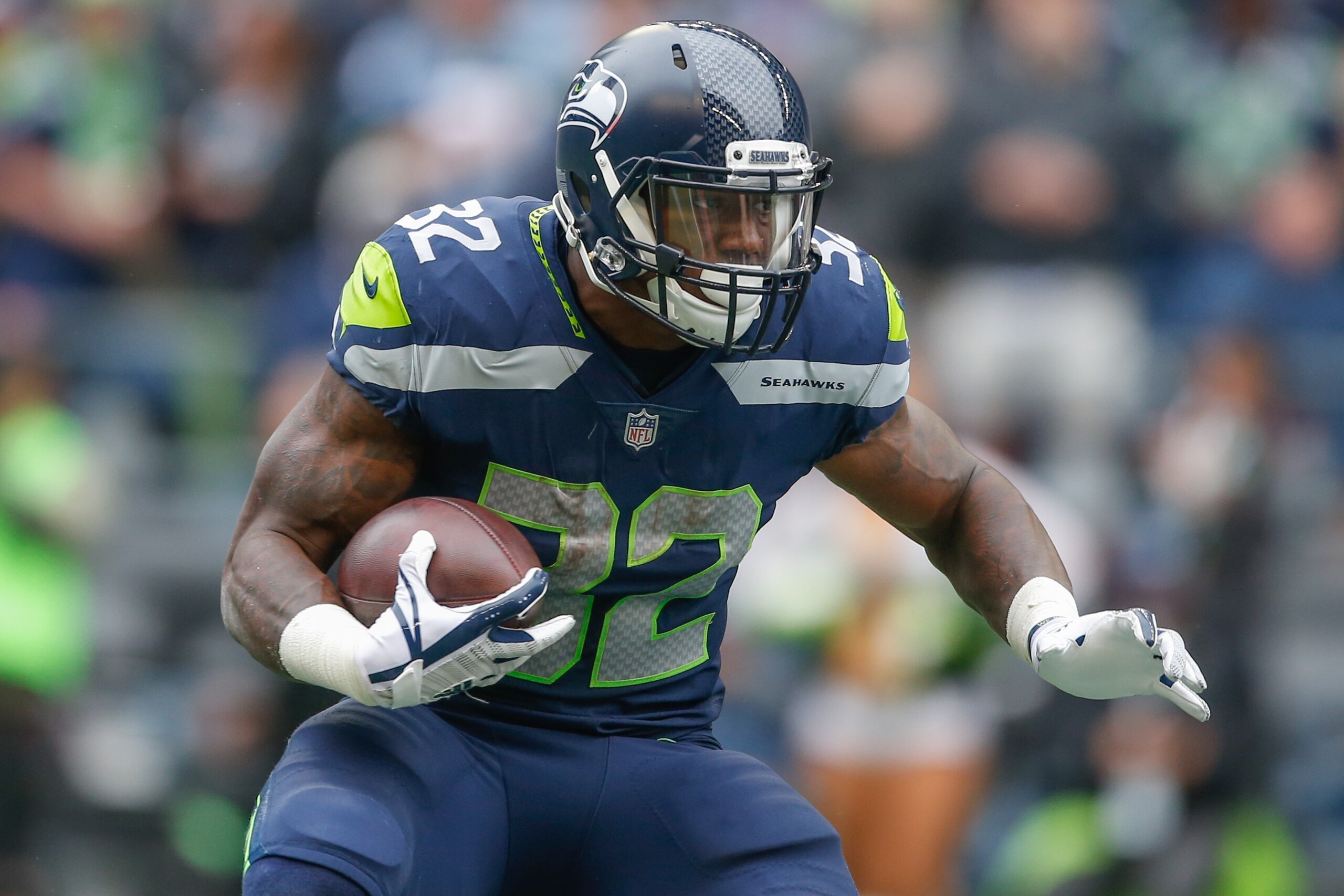 SEATTLE, WA - SEPTEMBER 17:  Running back Chris Carson #32 of the Seattle Seahawks rushes against the San Francisco 49ers at CenturyLink Field on September 17, 2017 in Seattle, Washington.  (Photo by Otto Greule Jr/Getty Images)
