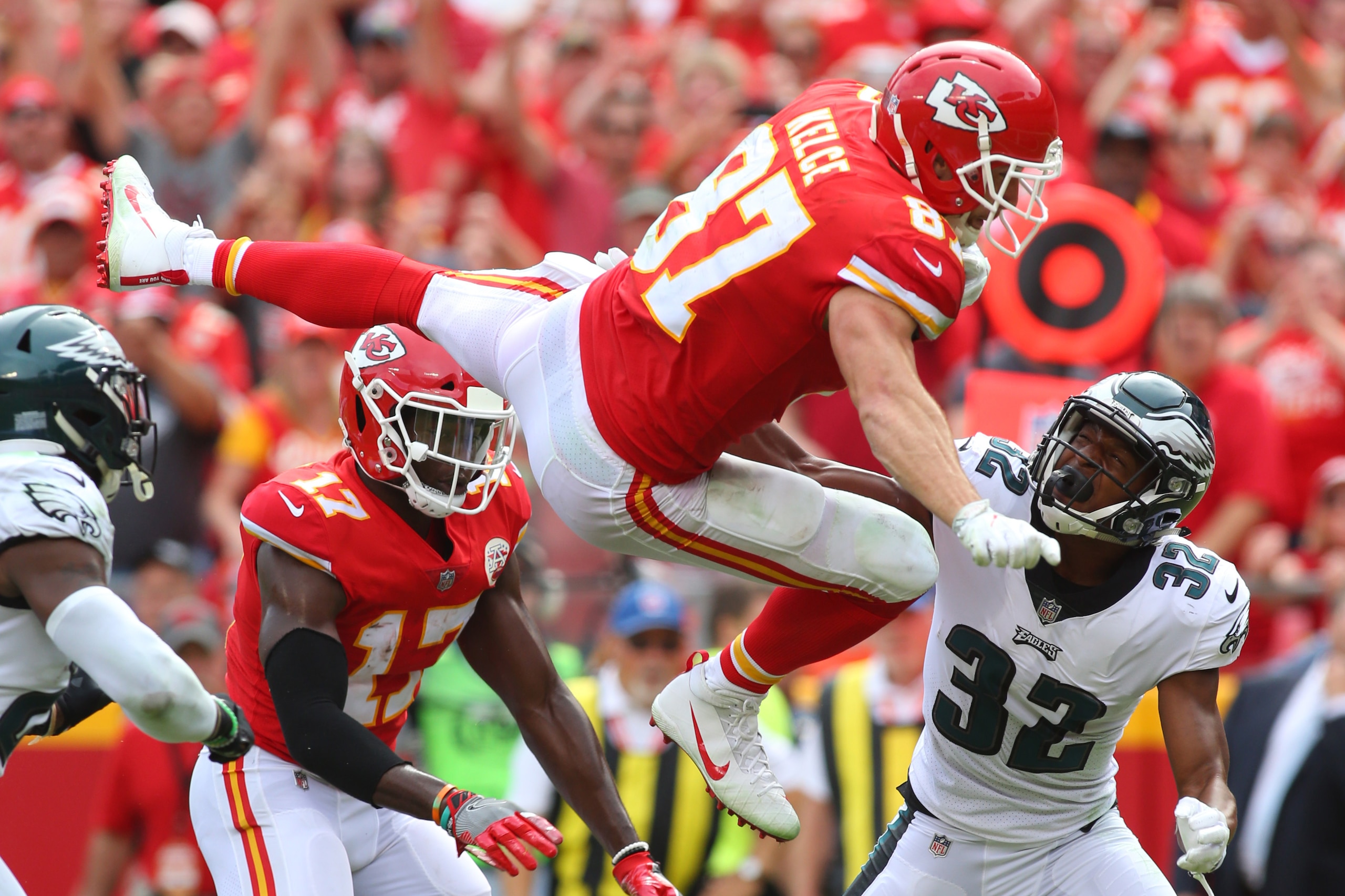 Sep 17, 2017; Kansas City, MO, USA; Kansas City Chiefs tight end Travis Kelce (87) leaps for a touchdown over Philadelphia Eagles cornerback Rasul Douglas (32) in the second half at Arrowhead Stadium. Mandatory Credit: Jay Biggerstaff-USA TODAY Sports