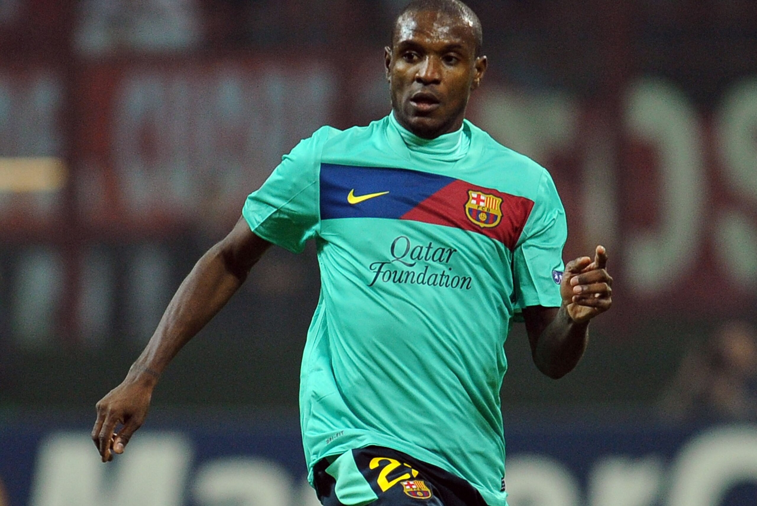 MILAN, ITALY - NOVEMBER 23:  Eric Abidal of FC Barcelona in action during the UEFA Champions League group H match between AC Milan and FC Barcelona at Giuseppe Meazza Stadium on November 23, 2011 in Milan, Italy.  (Photo by Valerio Pennicino/Getty Images)