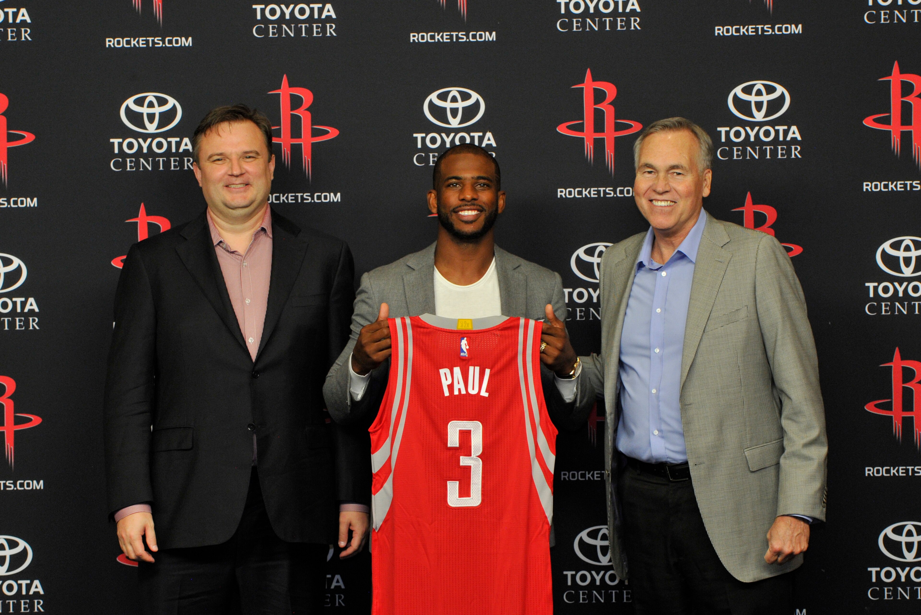 HOUSTON, TX  - JULY 14: General Manager Daryl Morey of the Houston Rockets, Chris Paul and Head Coach Mike D'Antoni poses for a photo during a press conference on July 14, 2017 at the Toyota Center in Houston, Texas. NOTE TO USER: User expressly acknowled