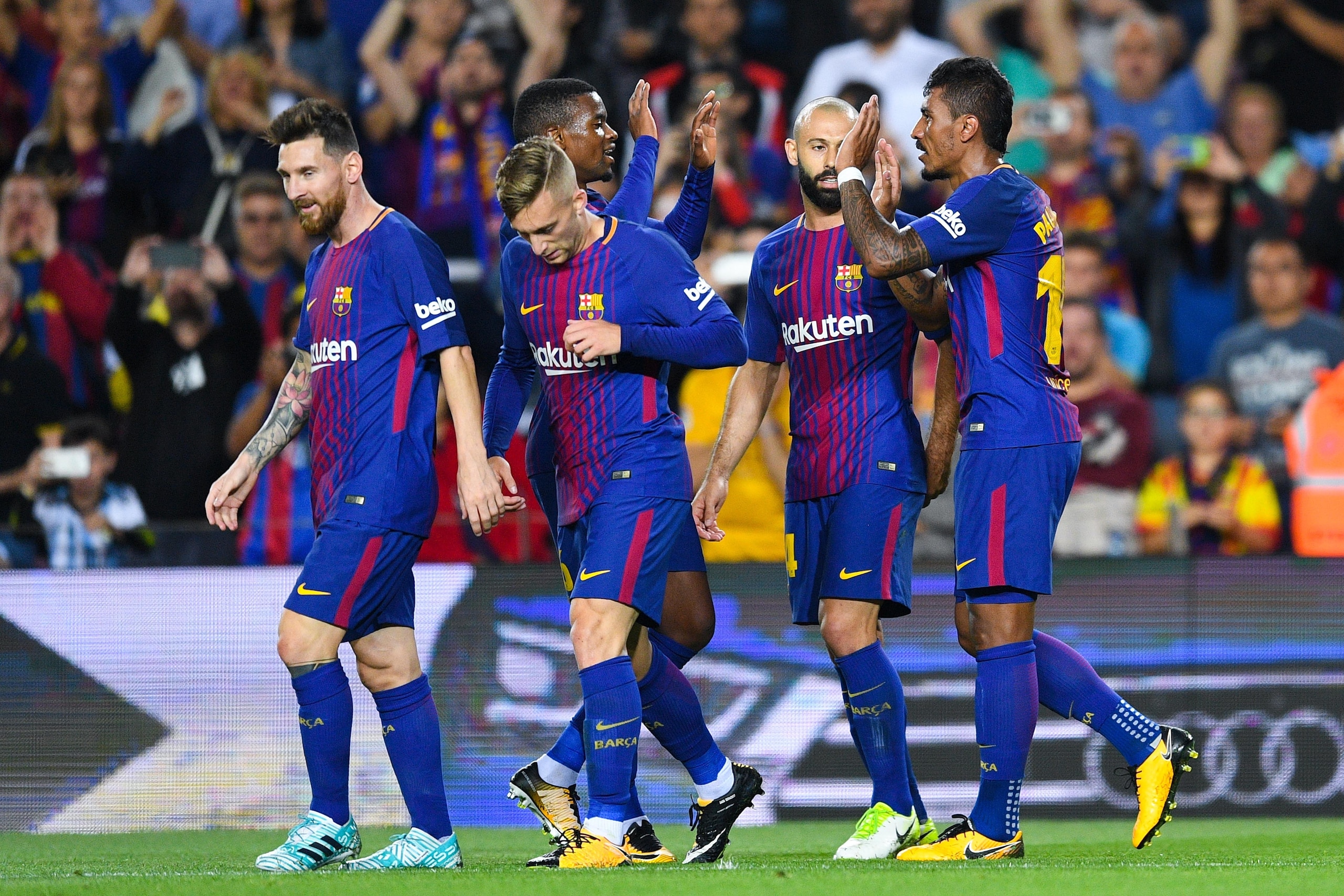 BARCELONA, SPAIN - SEPTEMBER 19:  Paulinho of FC Barcelona celebrates with his team mates after scoring his team's second goal during the La Liga match between Barcelona and SD Eibar at Camp Nou on September 19, 2017 in Barcelona, Spain.  (Photo by David 