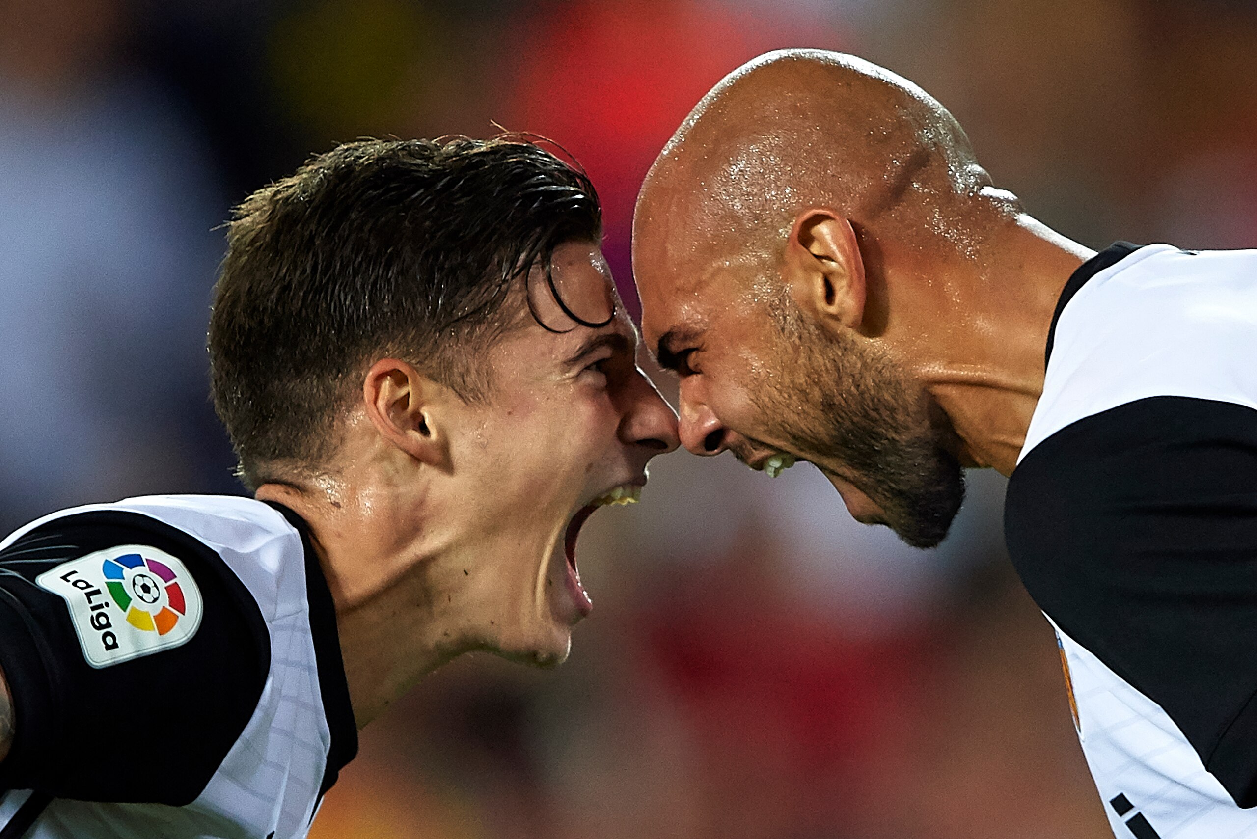 VALENCIA, SPAIN - SEPTEMBER 19:  Simone Zaza (R) of Valencia celebrates scoring his team's fourth goal with his teammate Santi Mina during the La Liga match between Valencia and Malaga at Estadio Mestalla on September 19, 2017 in Valencia, Spain.  (Photo 