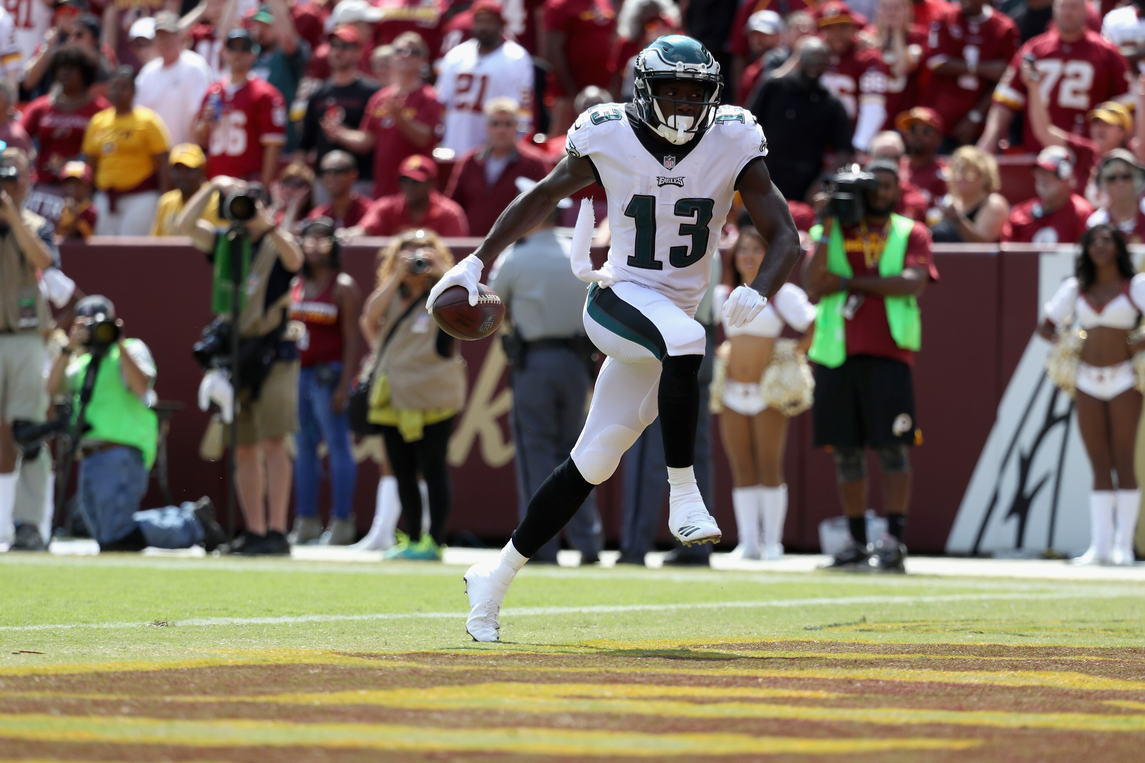 LANDOVER, MD - SEPTEMBER 10:  Wide receiver Nelson Agholor #13 of the Philadelphia Eagles celebrates after scoring a touchdown against the Washington Redskins in the first half at FedExField on September 10, 2017 in Landover, Maryland.  (Photo by Rob Carr