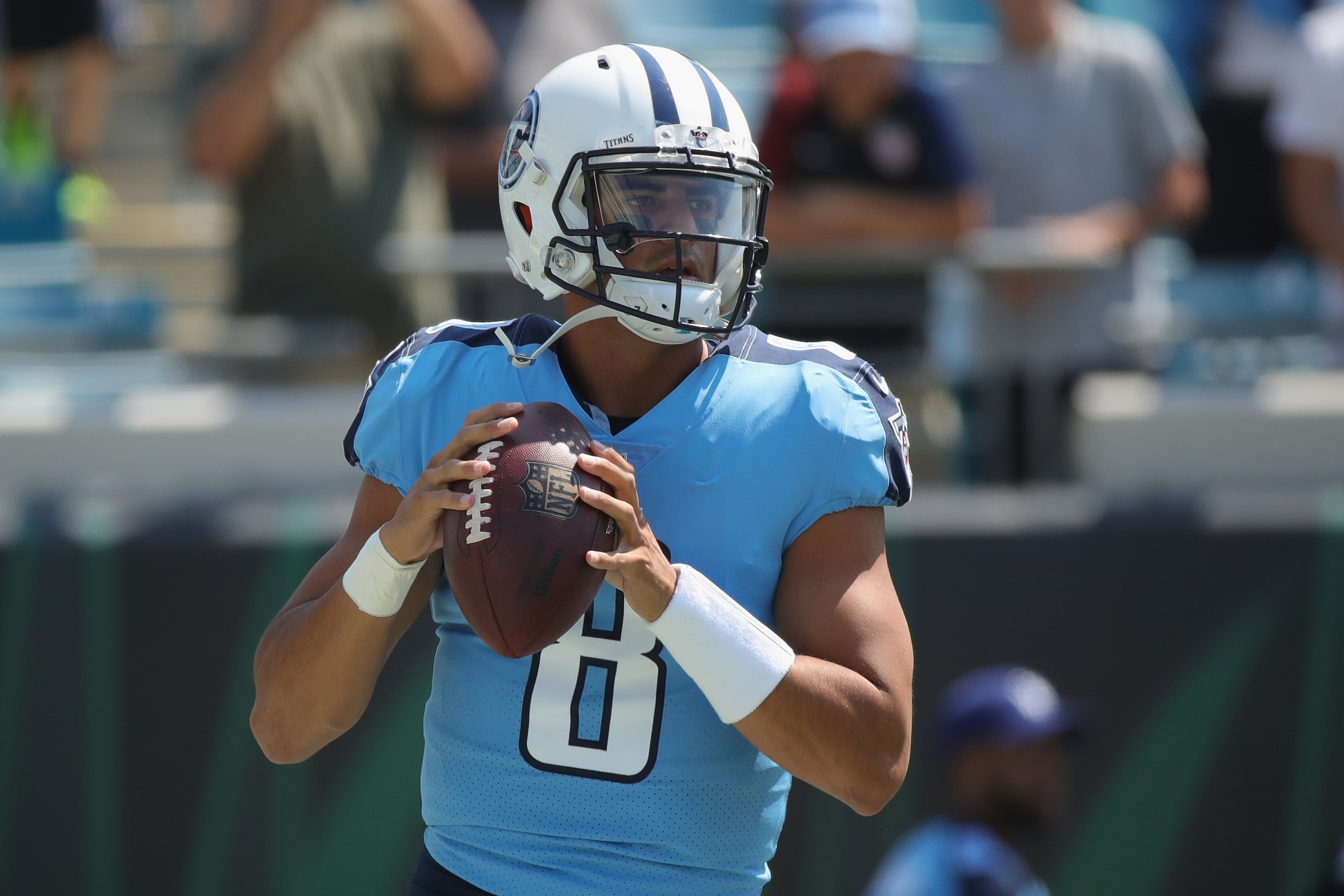 JACKSONVILLE, FL - SEPTEMBER 17:  Marcus Mariota #8 of the Tennessee Titans works out on the field prior to the start of their game against the Jacksonville Jaguars at EverBank Field on September 17, 2017 in Jacksonville, Florida.  (Photo by Logan Bowles/