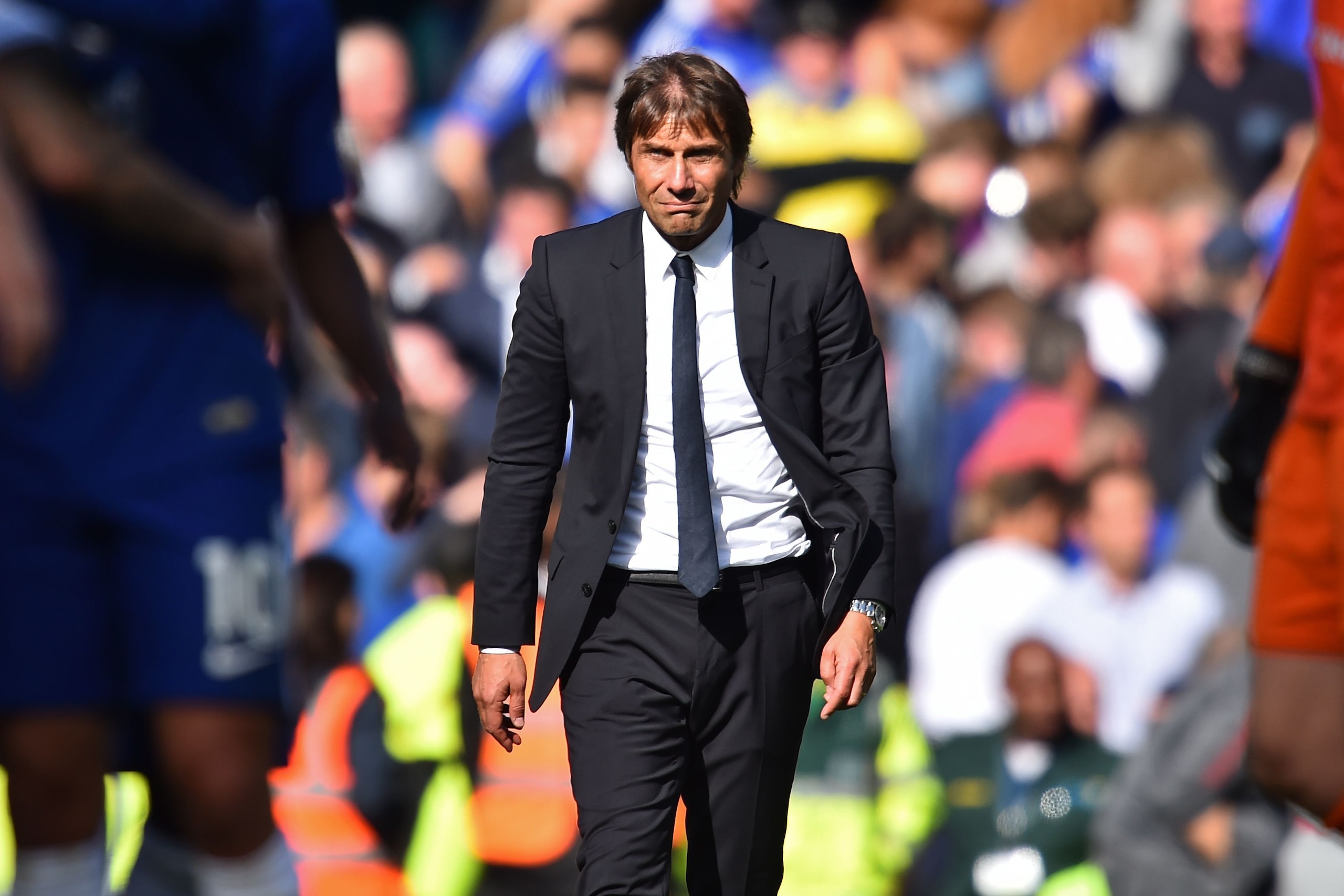 Chelsea's Italian head coach Antonio Conte on the pitch after the English Premier League football match between Chelsea and Arsenal at Stamford Bridge in London on September 17, 2017.
The game ended 0-0. / AFP PHOTO / Glyn KIRK / RESTRICTED TO EDITORIAL U Chelsea's Italian head coach Antonio Conte on the pitch after the English Premier League football match between Chelsea and Arsenal at Stamford Bridge in London on September 17, 2017.
The game ended 0-0. / AFP PHOTO / Glyn KIRK / RESTRICTED TO EDITORIAL U
