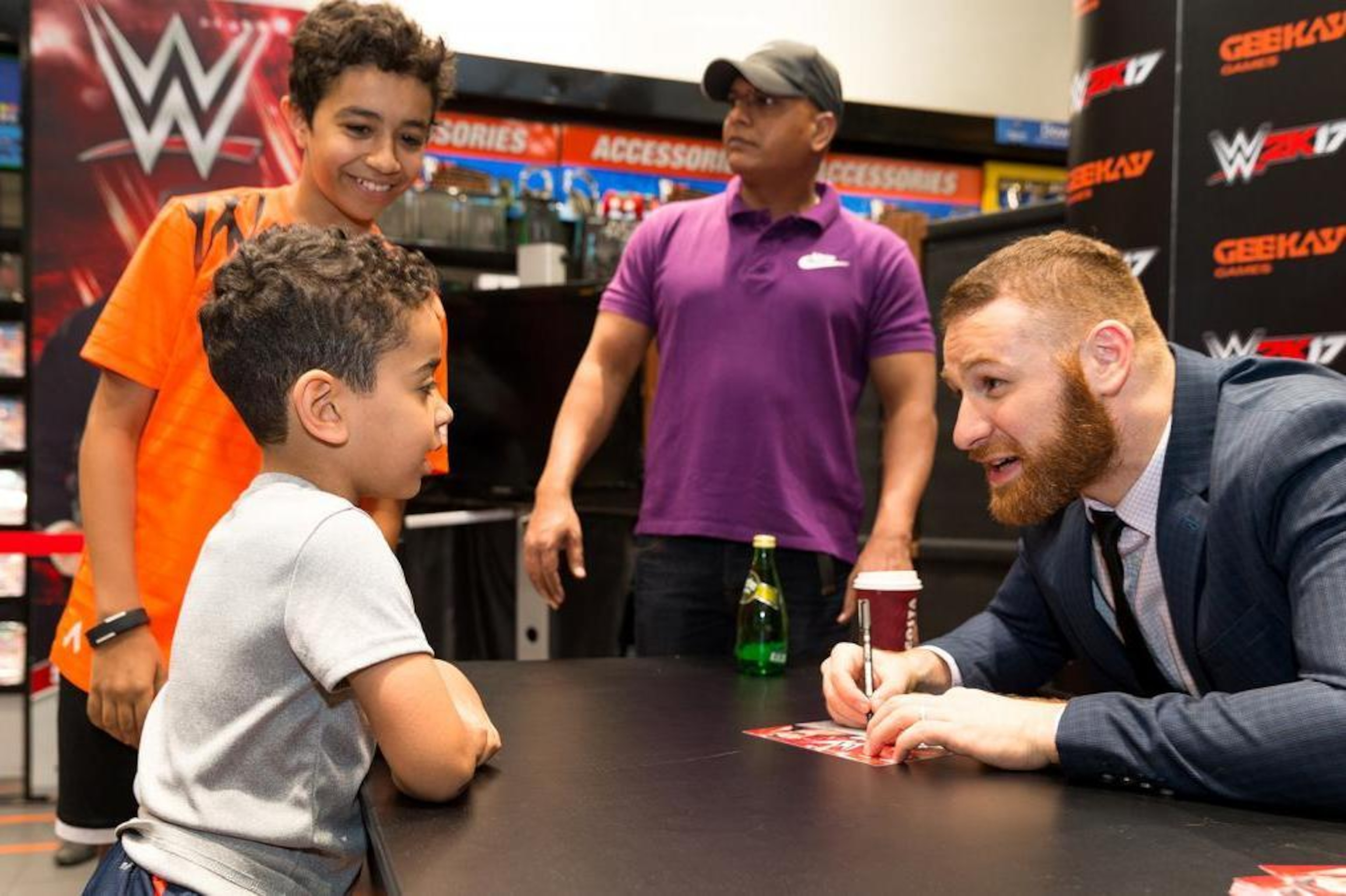Sami Zayn interacts with fans.