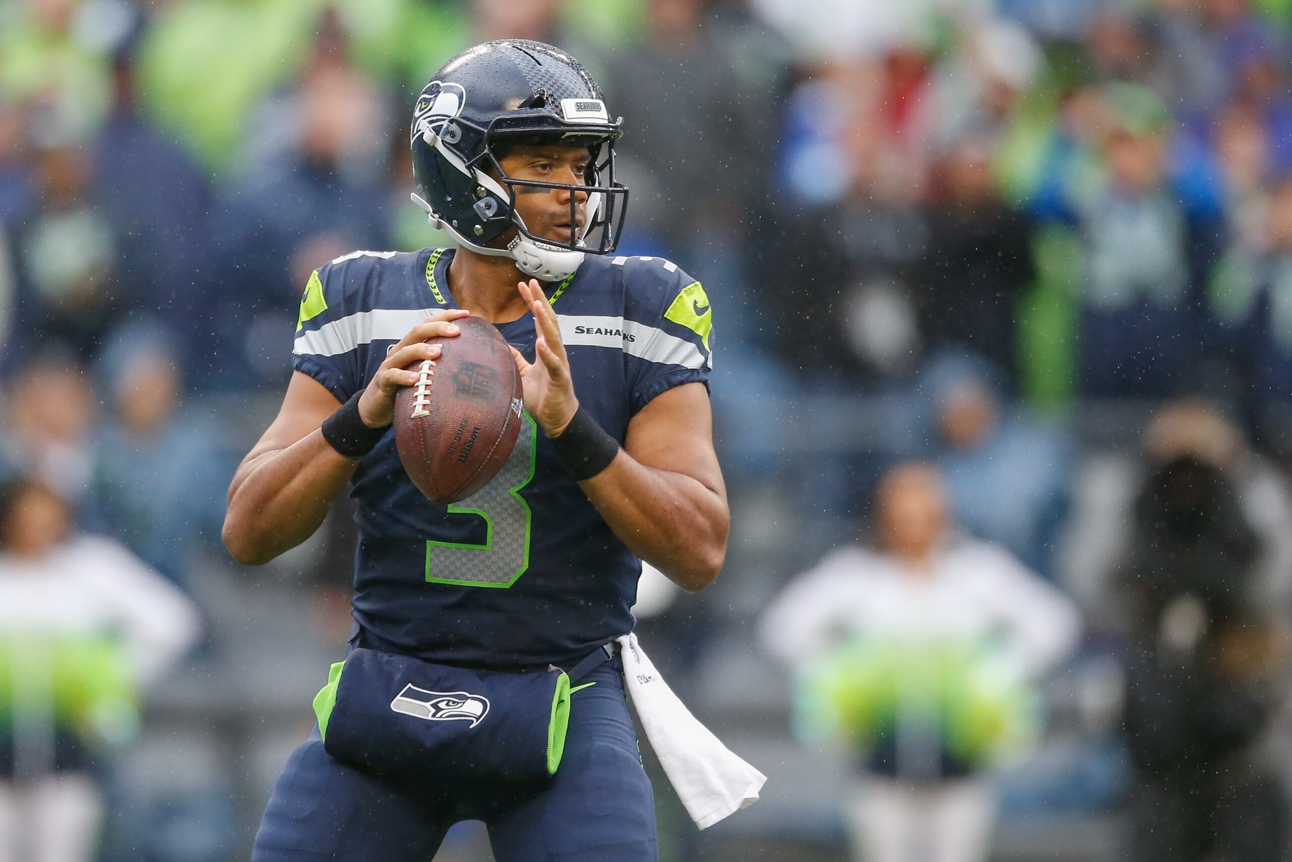 SEATTLE, WA - SEPTEMBER 17:  Quarterback Russell Wilson #3 of the Seattle Seahawks looks downfield to pass against the San Francisco 49ers at CenturyLink Field on September 17, 2017 in Seattle, Washington.  (Photo by Otto Greule Jr/Getty Images)