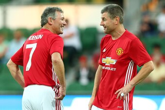 PERTH, AUSTRALIA - MARCH 25: Bryan Robson and Denis Irwin of the Manchester United Legends talk before the Manchester United Legends and the PFA Aussie Legends match at nib Stadium on March 25, 2017 in Perth, Australia.  (Photo by Paul Kane/Getty Images)