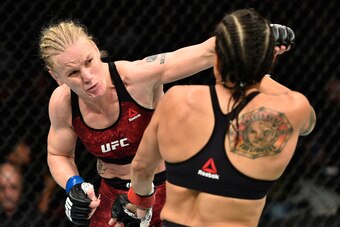 EDMONTON, AB - SEPTEMBER 09:  (L-R) Valentina Shevchenko of Kyrgyzstan punches Amanda Nunes of Brazil in their women's bantamweight bout during the UFC 215 event inside the Rogers Place on September 9, 2017 in Edmonton, Alberta, Canada. (Photo by Jeff Bot