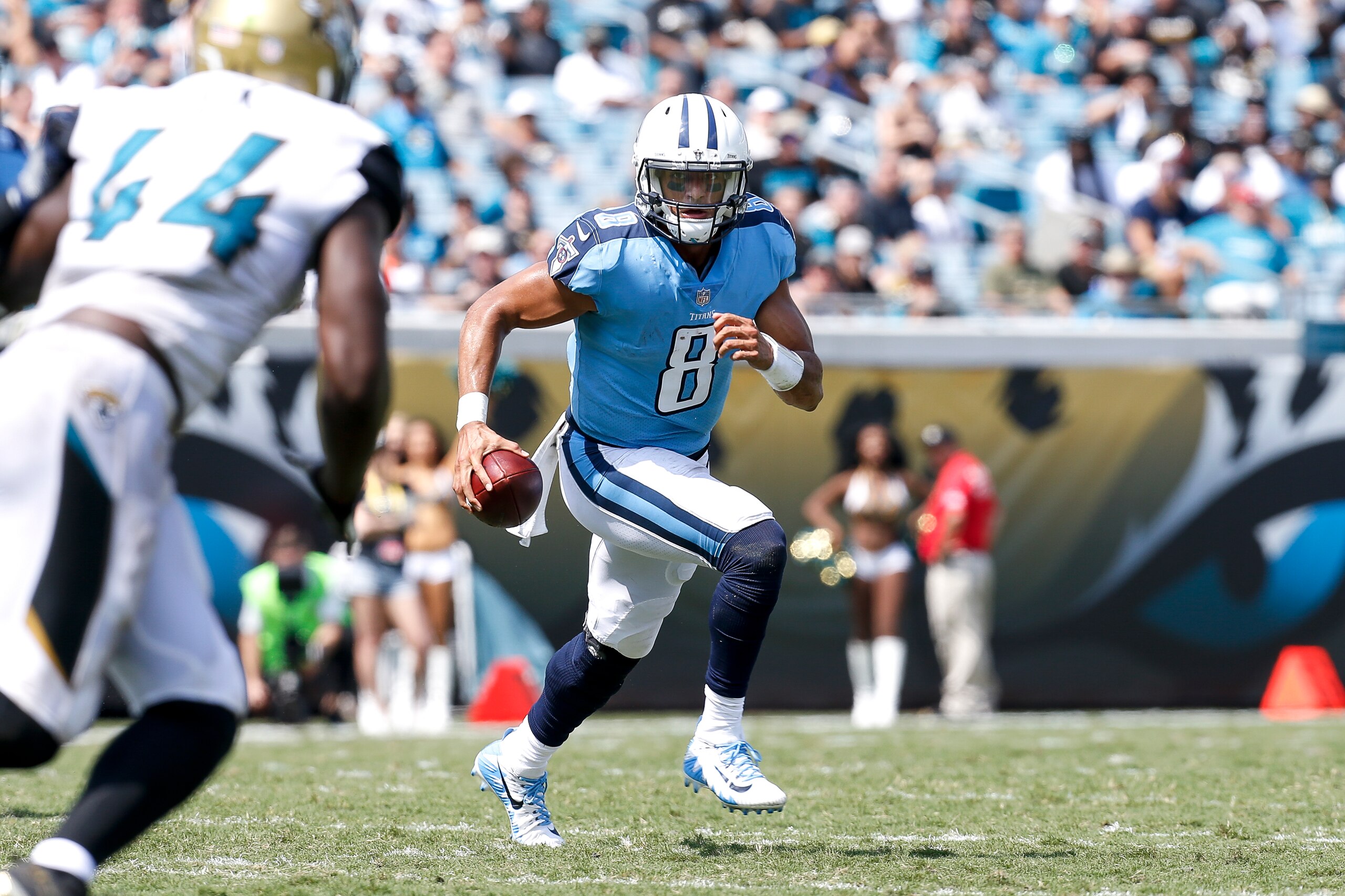 JACKSONVILLE, FL - SEPTEMBER 17: Quarterback Marcus Mariota #8 of the Tennessee Titans runs out the pocket during the game against the Jacksonville Jaguars at EverBank Field on September 17, 2017 in Jacksonville, Florida. The Titans defeated the Jaguars 3 JACKSONVILLE, FL - SEPTEMBER 17: Quarterback Marcus Mariota #8 of the Tennessee Titans runs out the pocket during the game against the Jacksonville Jaguars at EverBank Field on September 17, 2017 in Jacksonville, Florida. The Titans defeated the Jaguars 3