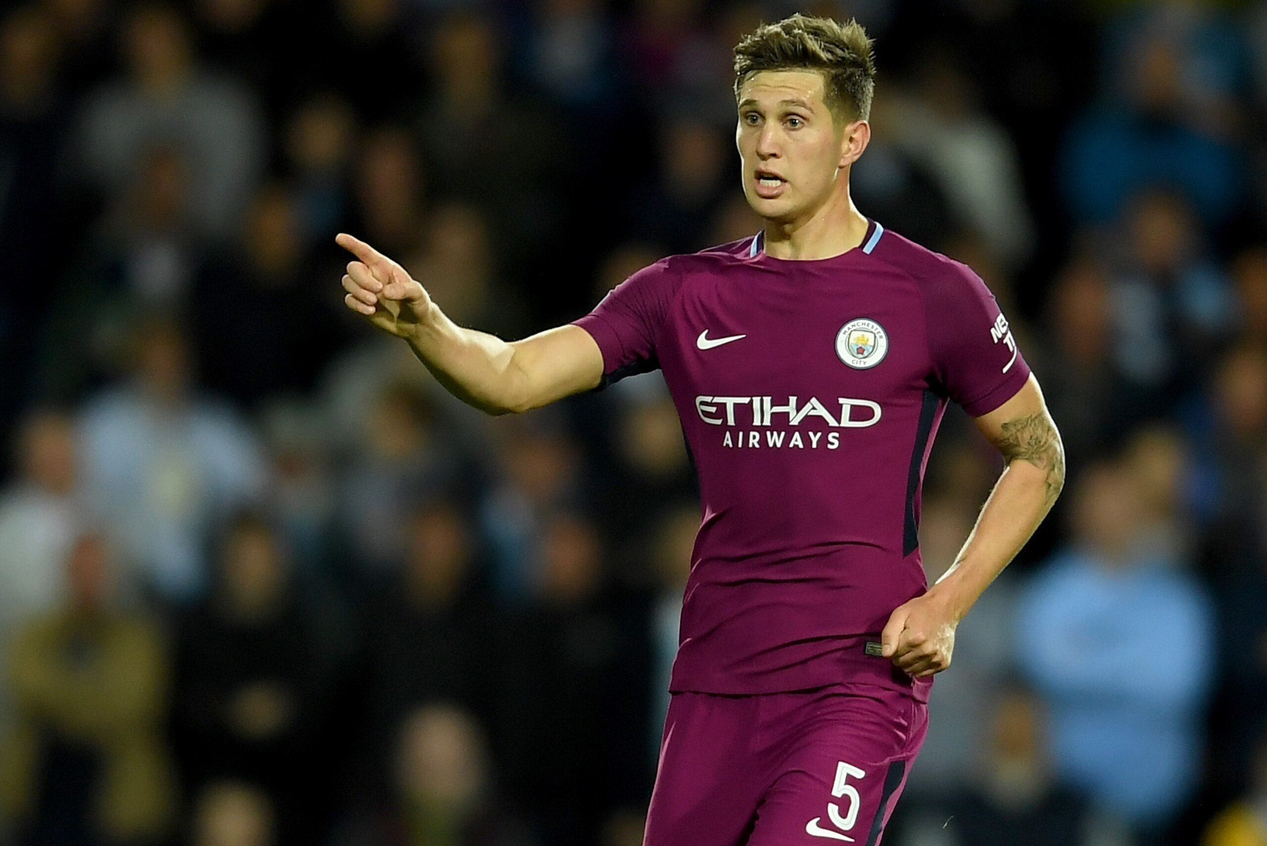 WEST BROMWICH, ENGLAND - SEPTEMBER 20:  John Stones of Manchester City in action during the Carabao Cup third round match between West Bromwich Albion and Manchester City at The Hawthorns on September 20, 2017 in West Bromwich, England.  (Photo by Ross Ki