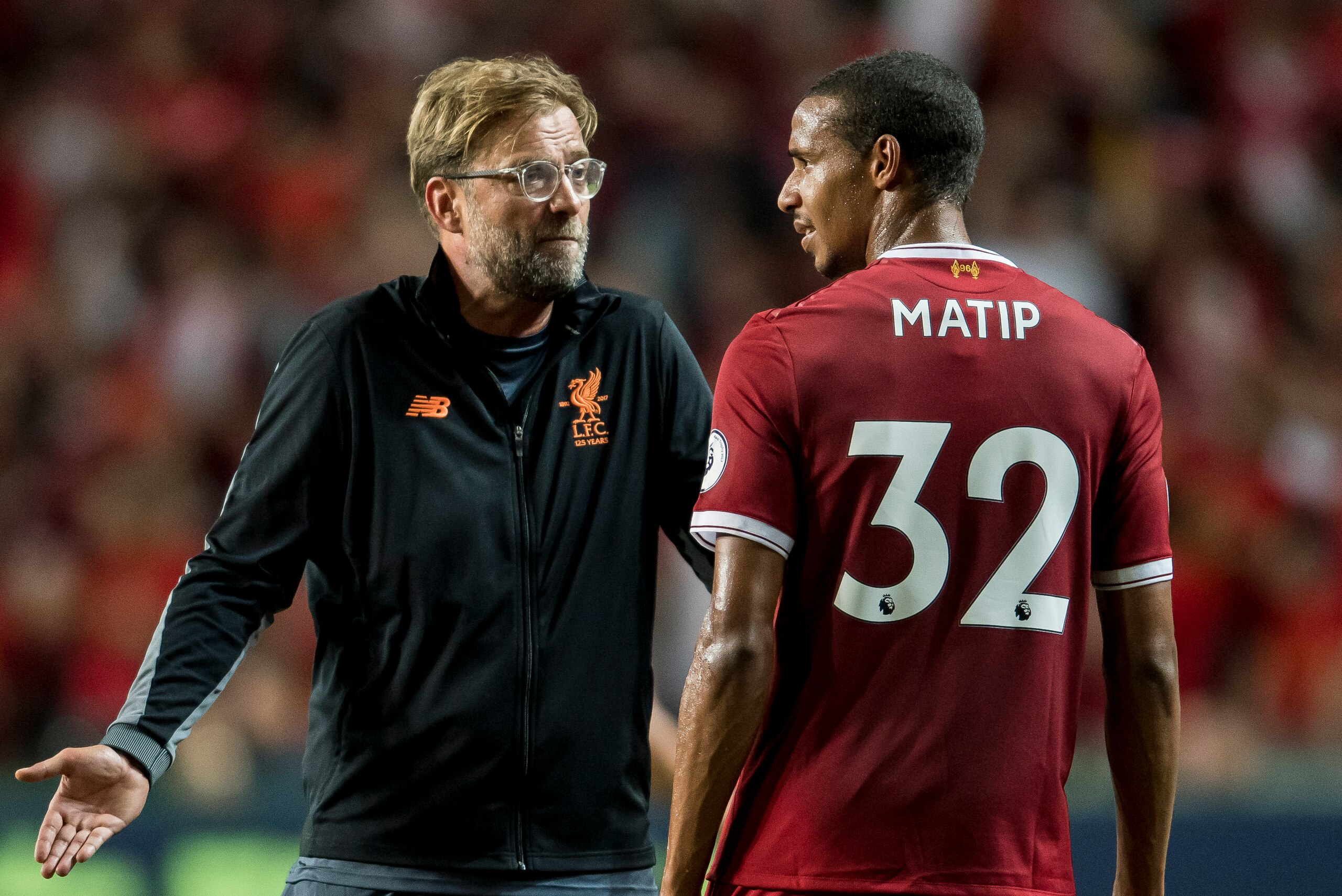 HONG KONG, HONG KONG - JULY 22: Liverpool FC Coach Jurgen Klopp (L) talks to Liverpool FC defender Joel Matip (R) during the Premier League Asia Trophy match between Liverpool FC and Leicester City FC at Hong Kong Stadium on July 22, 2017 in Hong Kong, Ho