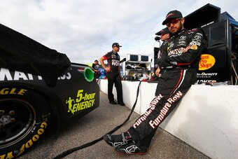 LOUDON, NH - SEPTEMBER 22:  Martin Truex Jr., driver of the #78 Furniture Row/Denver Mattress Toyota, prepares to drive during qualifying for the Monster Energy NASCAR Cup Series ISM Connect 300 at New Hampshire Motor Speedway on September 22, 2017 in Lou