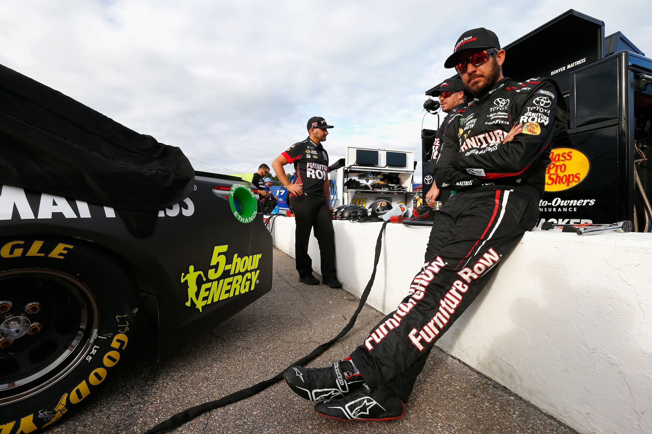 LOUDON, NH - SEPTEMBER 22:  Martin Truex Jr., driver of the #78 Furniture Row/Denver Mattress Toyota, prepares to drive during qualifying for the Monster Energy NASCAR Cup Series ISM Connect 300 at New Hampshire Motor Speedway on September 22, 2017 in Lou