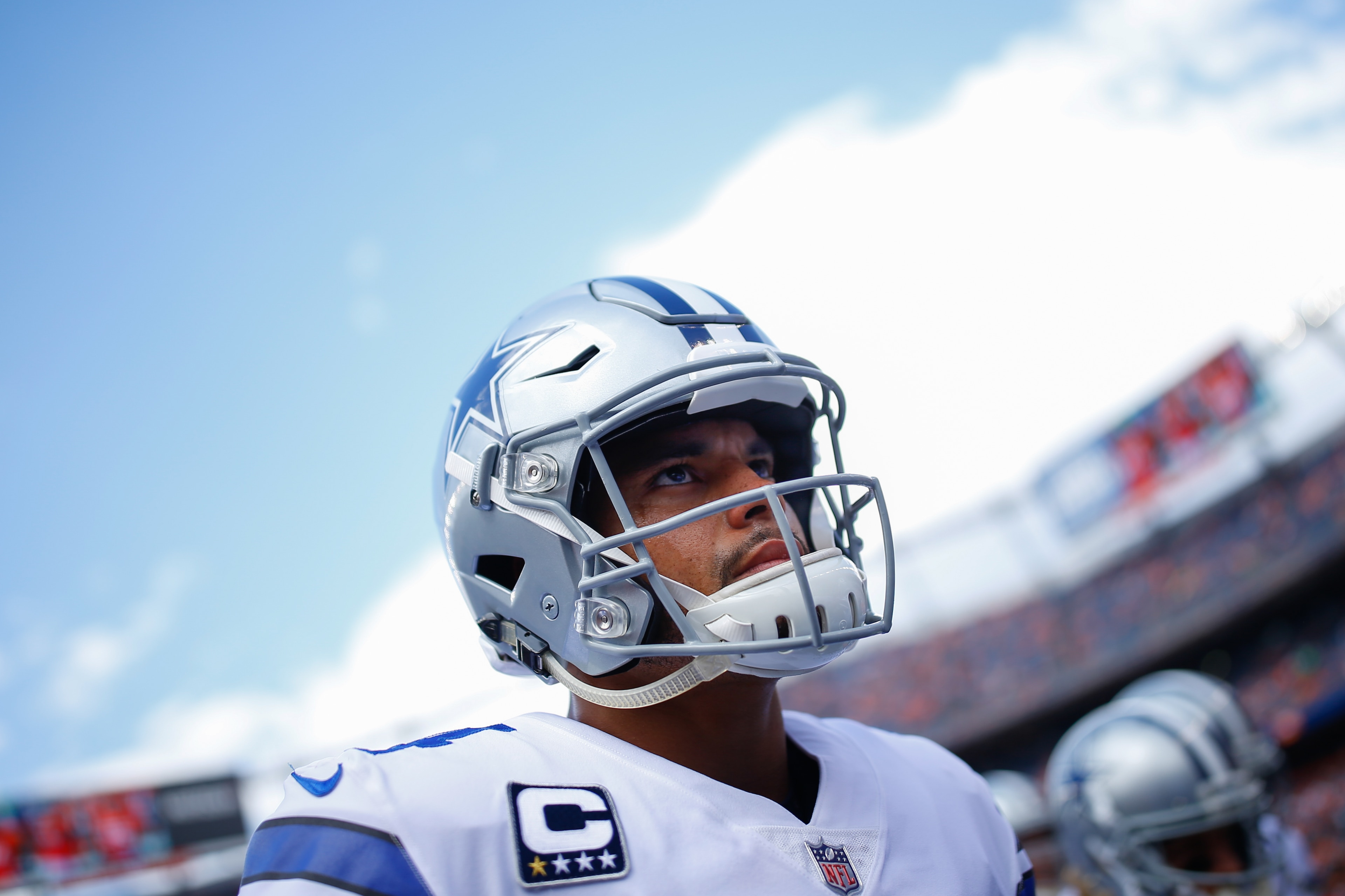 DENVER, CO - SEPTEMBER 17:  Quarterback Dak Prescott #4 of the Dallas Cowboys looks on from the field against the Denver Broncos at Sports Authority Field at Mile High on September 17, 2017 in Denver, Colorado. (Photo by Justin Edmonds/Getty Images)