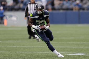 SEATTLE, WA - SEPTEMBER 17: Running back Chris Carson #32 of the Seattle Seahawks runs with the ball during a game against the San Francisco 49ers at CenturyLink Field on September 17, 2017 in Seattle, Washington. The Seahawks won the game 12-9. (Photo by