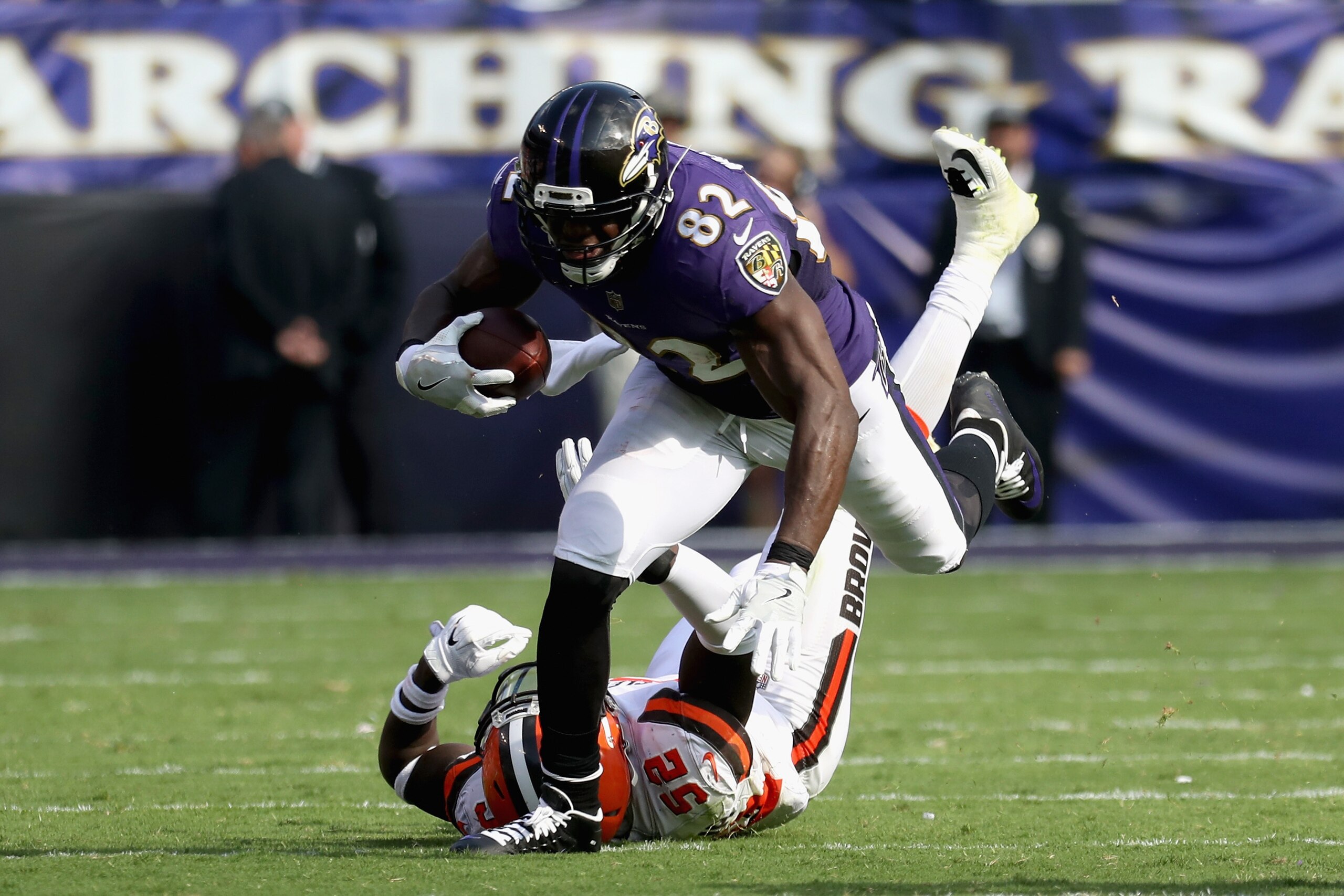 BALTIMORE, MD - SEPTEMBER 17: Tight end Benjamin Watson #82 of the Baltimore Ravens is tackled by inside linebacker James Burgess #52 of the Cleveland Browns at M&T Bank Stadium on September 17, 2017 in Baltimore, Maryland.  (Photo by Rob Carr/Getty Image