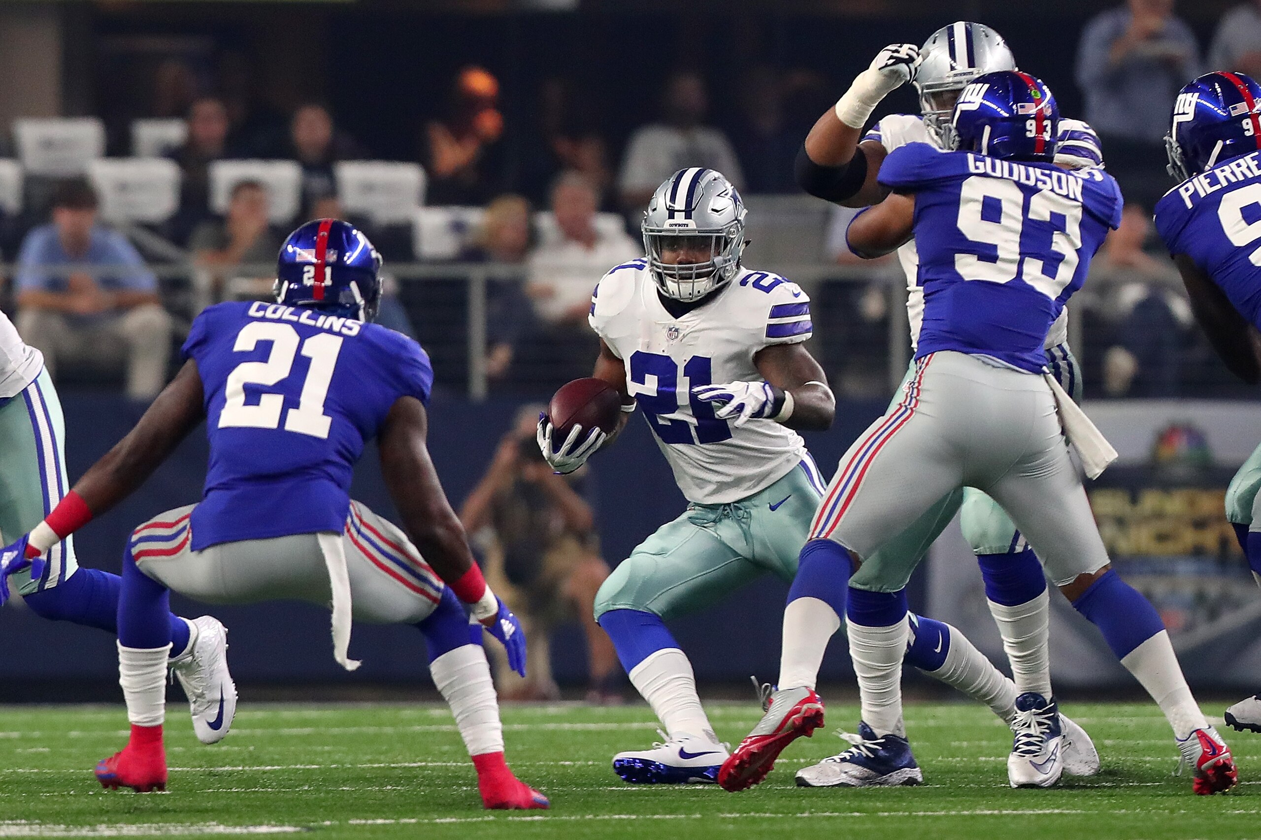 ARLINGTON, TX - SEPTEMBER 10:  Landon Collins #21 of the New York Giants and B.J. Goodson #93 of the New York Giants try to stop the run by Ezekiel Elliott #21 of the Dallas Cowboys in the first quarter of a game at AT&T Stadium on September 10, 2017 in A