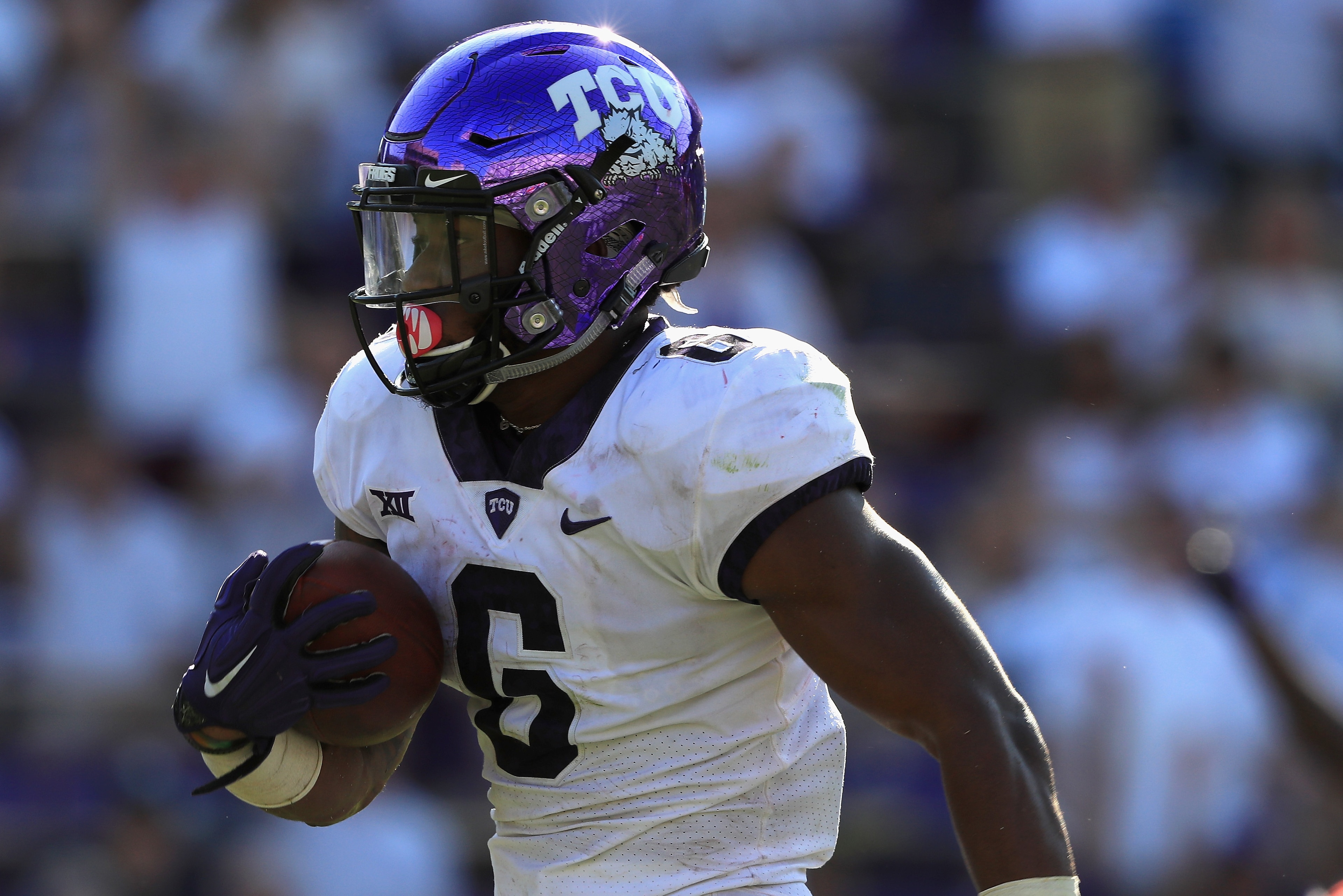 FORT WORTH, TX - SEPTEMBER 16:  Darius Anderson #6 of the TCU Horned Frogs runs the ball for a touchdown against the Southern Methodist Mustangs in the second half at Amon G. Carter Stadium on September 16, 2017 in Fort Worth, Texas.  (Photo by Ronald Mar