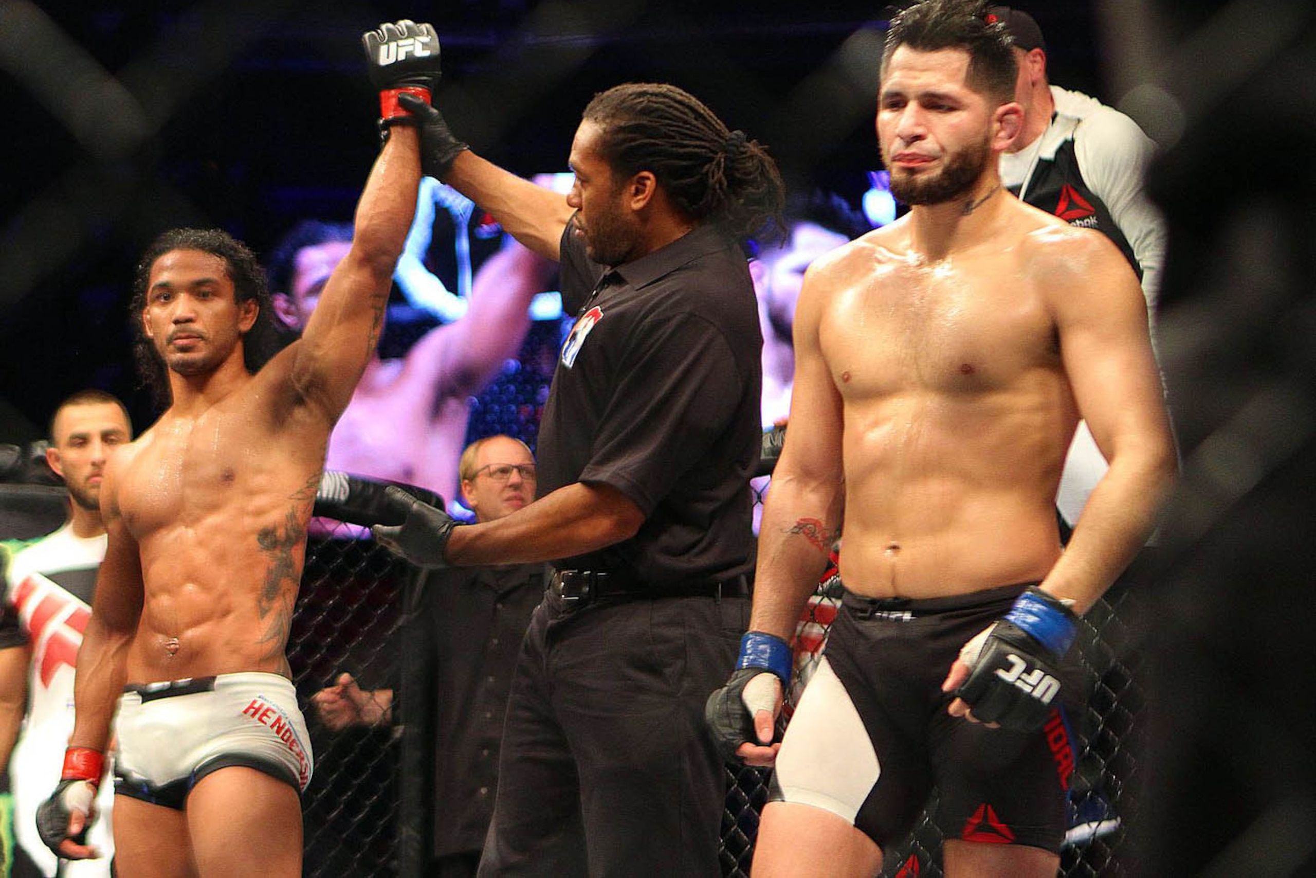 Nov 28, 2015; Seoul, South Korea; Benson Henderson (red gloves) competes against Jorge Masvidal (blue gloves) during UFC Fight Night at Olympic Gymnastics Arena. Mandatory Credit: Lili Troncale-USA TODAY Sports