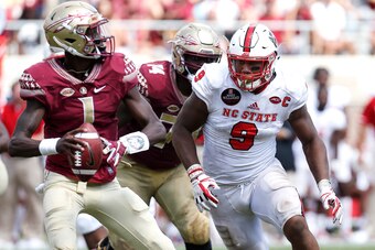 TALLAHASSEE, FL - SEPTEMBER 23: Defensive End Bradley Chubb #9 of the North Carolina State Wolfpack rushes in on Quarterback James Blackmon #1 of the Florida State Seminoles during the game at Doak Campbell Stadium on Bobby Bowden Field on September 23, 2