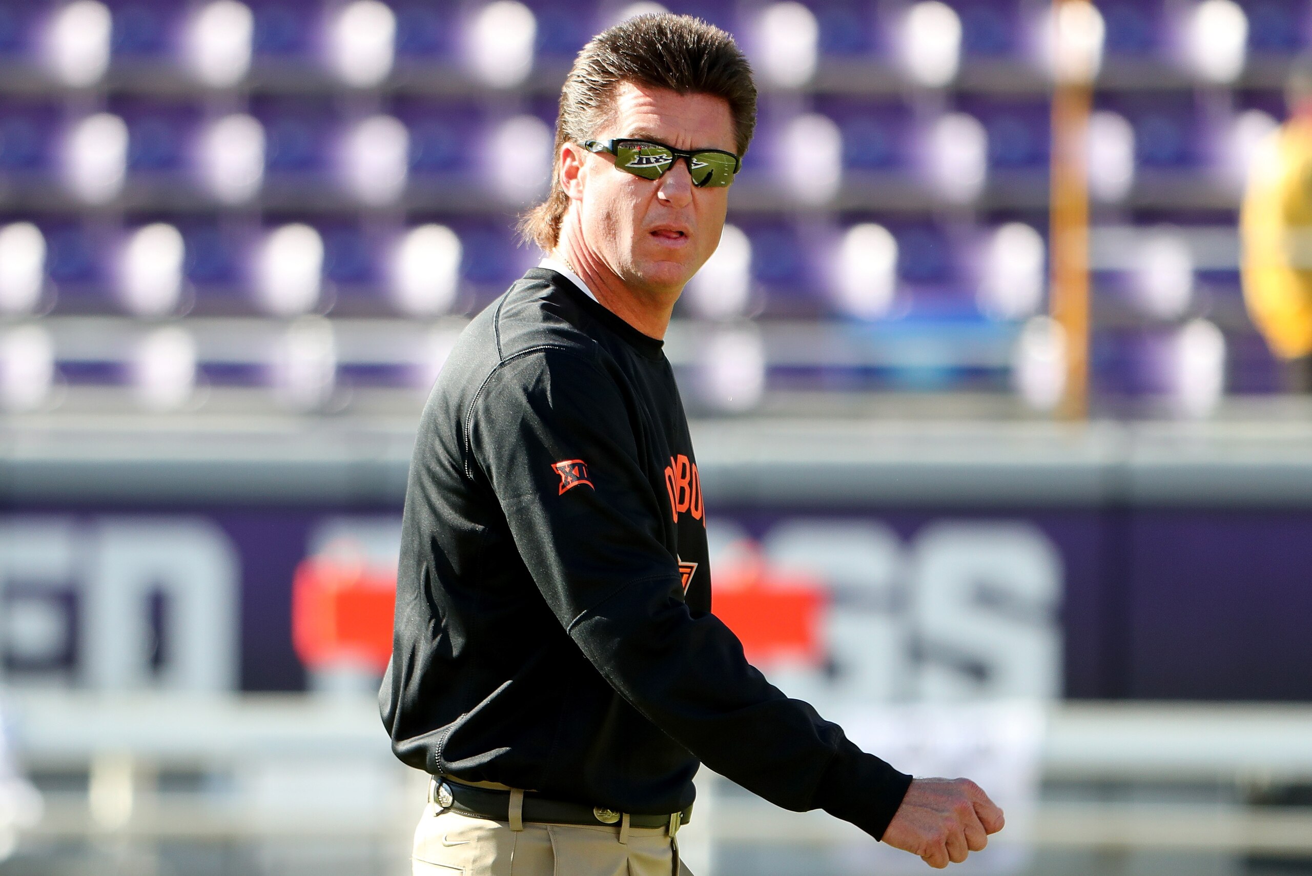 FORT WORTH, TX - NOVEMBER 19:  Head coach Mike Gundy of the Oklahoma State Cowboys prepares his team to take on the TCU Horned Frogs at Amon G. Carter Stadium on November 19, 2016 in Fort Worth, Texas.  (Photo by Tom Pennington/Getty Images)