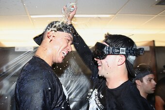 TORONTO, ON - SEPTEMBER 23: Aaron Judge #99 of the New York Yankees is sprayed as they celebrate their playoff-clinching victory during MLB game action against the Toronto Blue Jays at Rogers Centre on September 23, 2017 in Toronto, Canada. (Photo by Tom TORONTO, ON - SEPTEMBER 23: Aaron Judge #99 of the New York Yankees is sprayed as they celebrate their playoff-clinching victory during MLB game action against the Toronto Blue Jays at Rogers Centre on September 23, 2017 in Toronto, Canada. (Photo by Tom