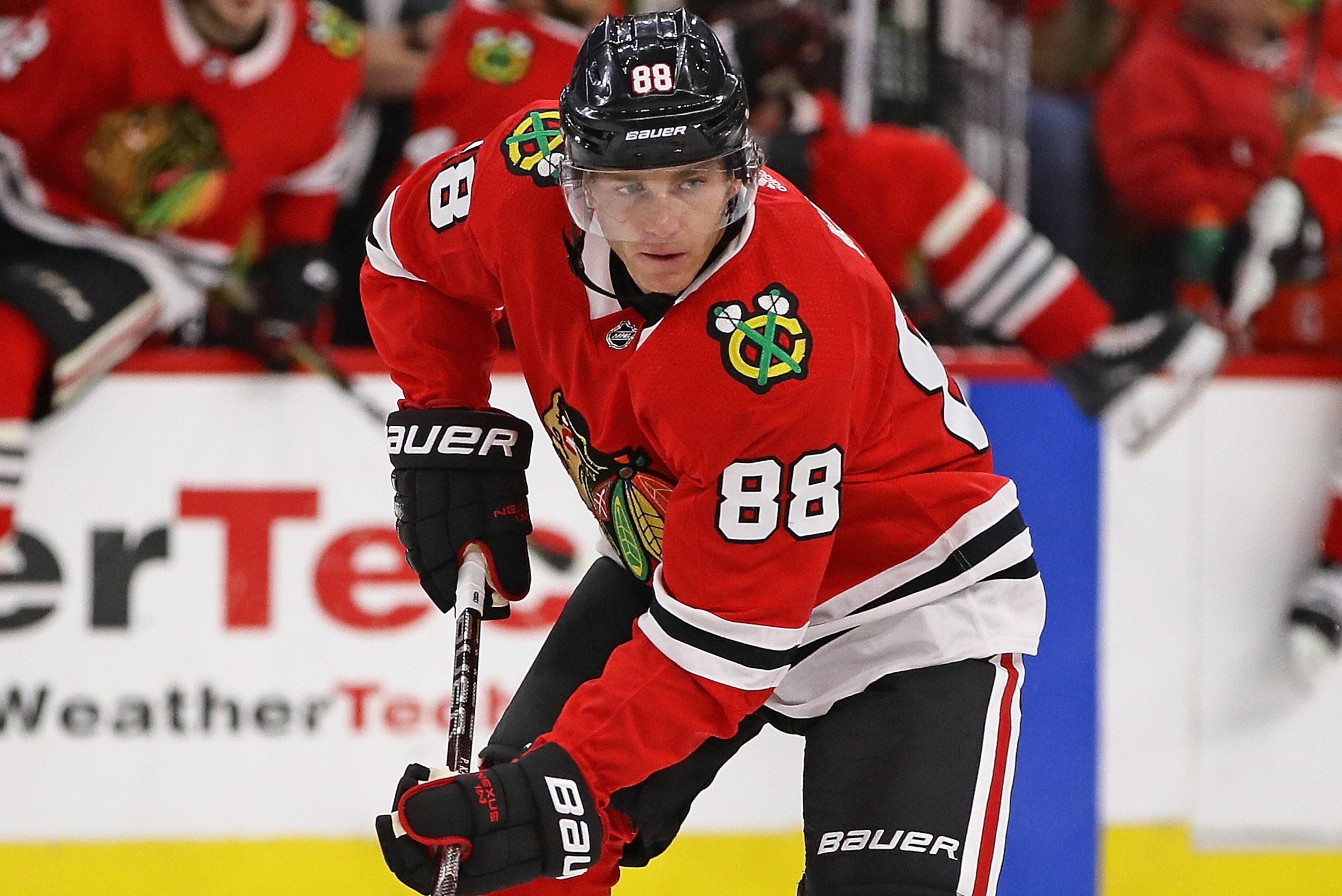 CHICAGO, IL - SEPTEMBER 23:   Patrick Kane #88 of the Chicago Blackhawks advances the puck against the Columbus Blue Jackets during a preseason game at the United Center on September 23, 2017 in Chicago, Illinois. The Blue Jackets defeated the Blackhawks 