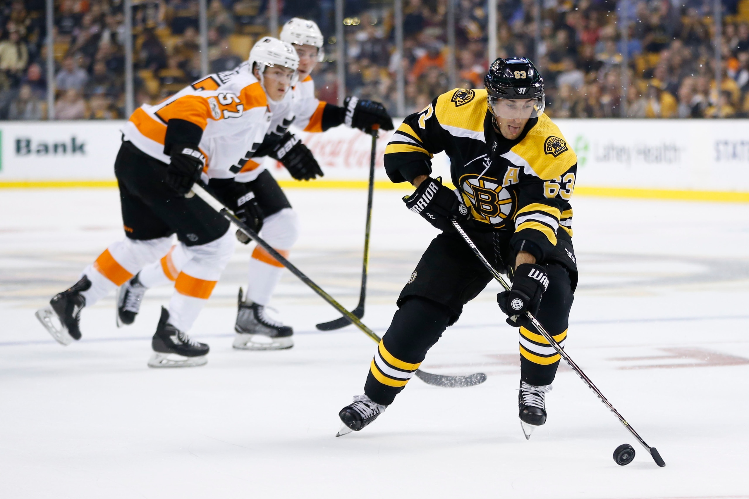 Sep 21, 2017; Boston, MA, USA; Boston Bruins left wing Brad Marchand (63) controls the puck during the first period against the Philadelphia Flyers at TD Garden. Mandatory Credit: Greg M. Cooper-USA TODAY Sports Sep 21, 2017; Boston, MA, USA; Boston Bruins left wing Brad Marchand (63) controls the puck during the first period against the Philadelphia Flyers at TD Garden. Mandatory Credit: Greg M. Cooper-USA TODAY Sports