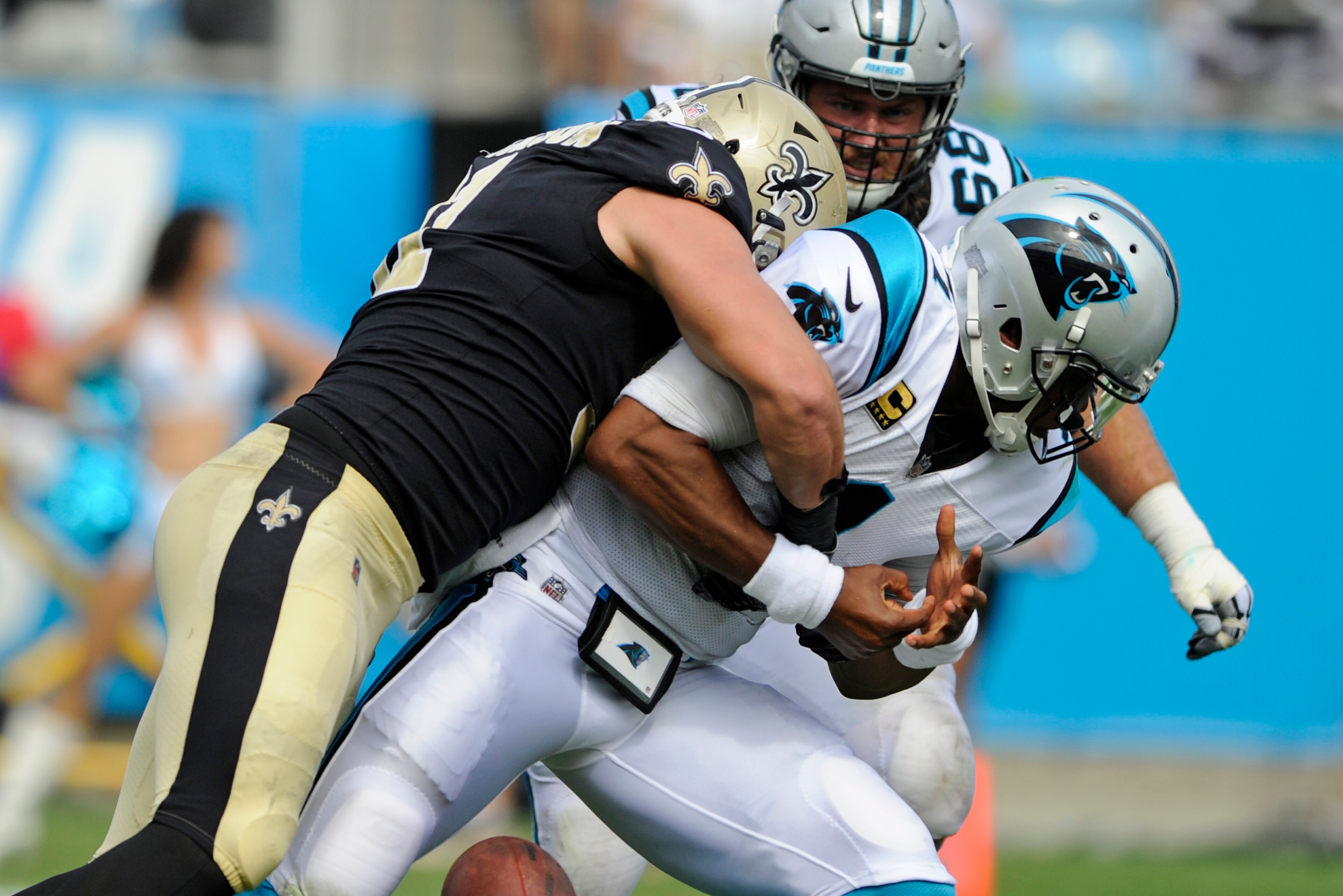 Cam Newton is struggling to stay upright.