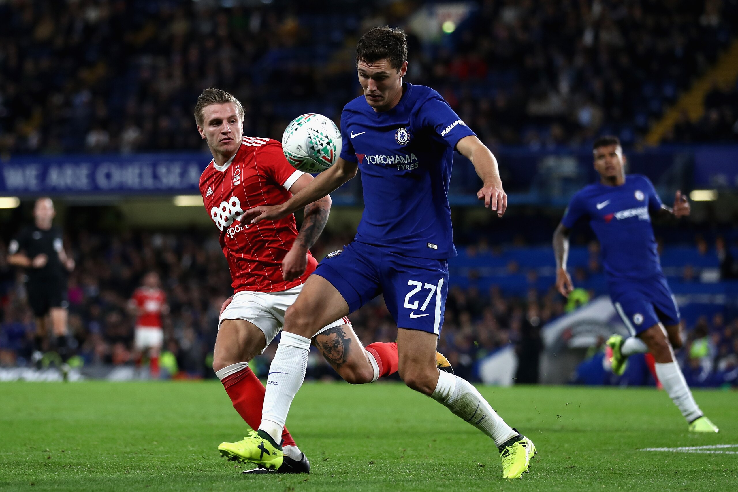 LONDON, ENGLAND - SEPTEMBER 20:  Andreas Christensen of Chelsea and Jason Cummings of Nottingham Forest battle for possession  during the Carabao Cup Third Round match between Chelsea and Nottingham Forest at Stamford Bridge on September 19, 2017 in Londo