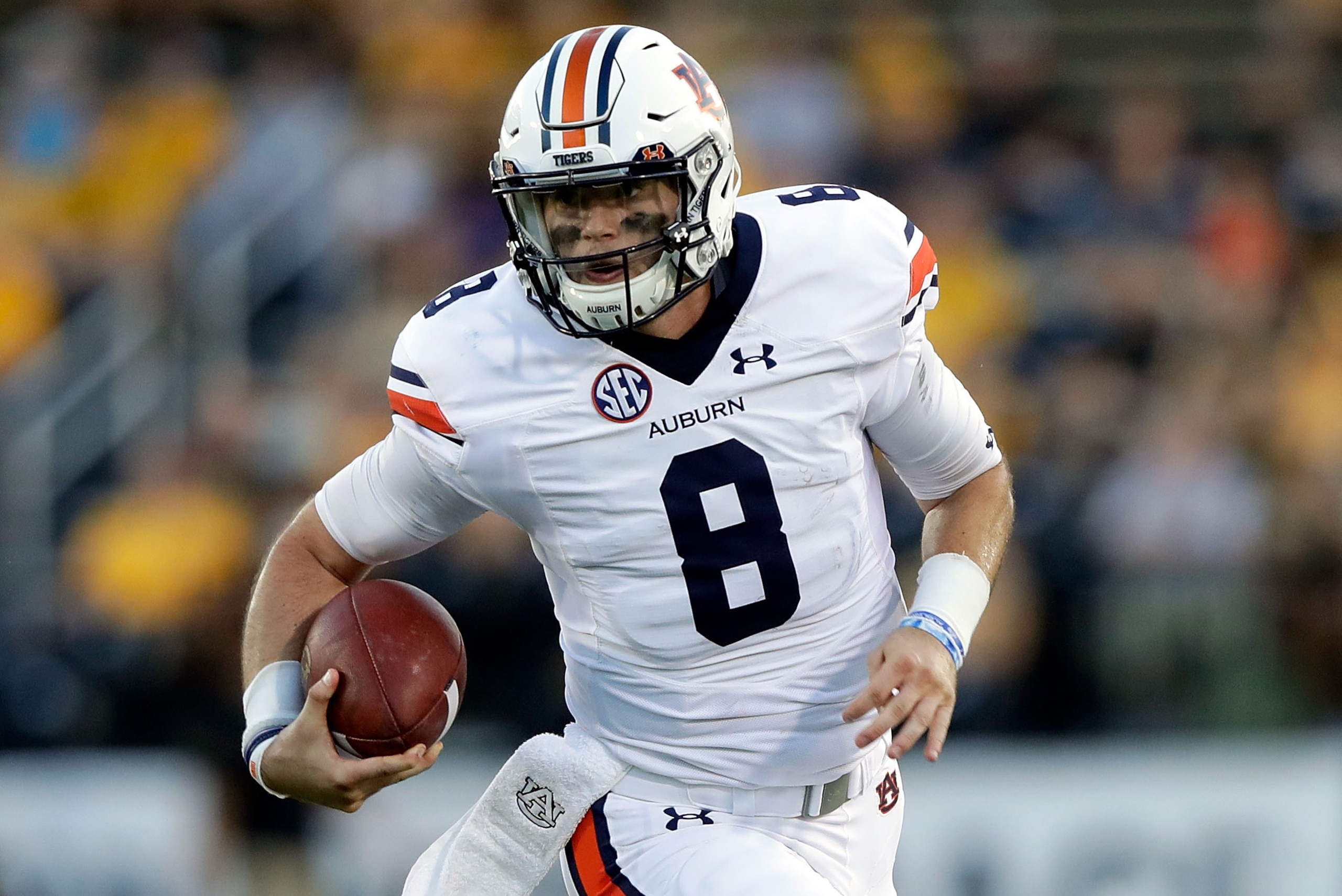 COLUMBIA, MO - SEPTEMBER 23: Quarterback Jarrett Stidham #8 of the Auburn Tigers scrambles during the game against the Missouri Tigers at Faurot Field/Memorial Stadium on September 23, 2017 in Columbia, Missouri. (Photo by Jamie Squire/Getty Images) COLUMBIA, MO - SEPTEMBER 23: Quarterback Jarrett Stidham #8 of the Auburn Tigers scrambles during the game against the Missouri Tigers at Faurot Field/Memorial Stadium on September 23, 2017 in Columbia, Missouri. (Photo by Jamie Squire/Getty Images)