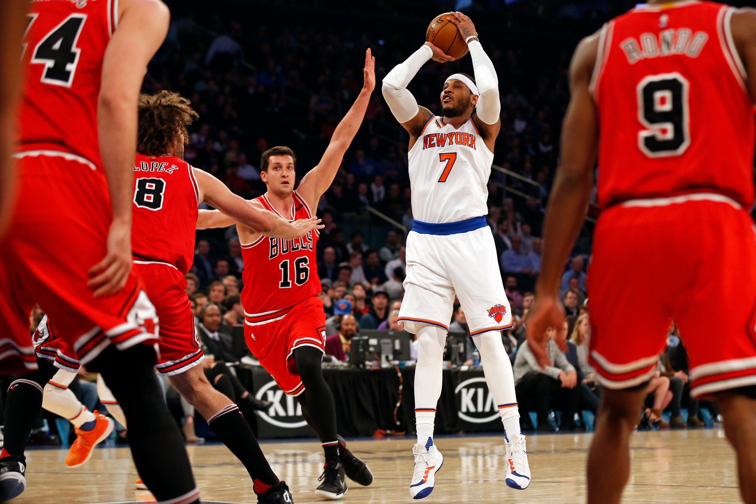 Apr 4, 2017; New York, NY, USA; New York Knicks forward Carmelo Anthony (7) shoots in front of Chicago Bulls forward Paul Zipser (16) during the first quarter at Madison Square Garden. Mandatory Credit: Adam Hunger-USA TODAY Sports
