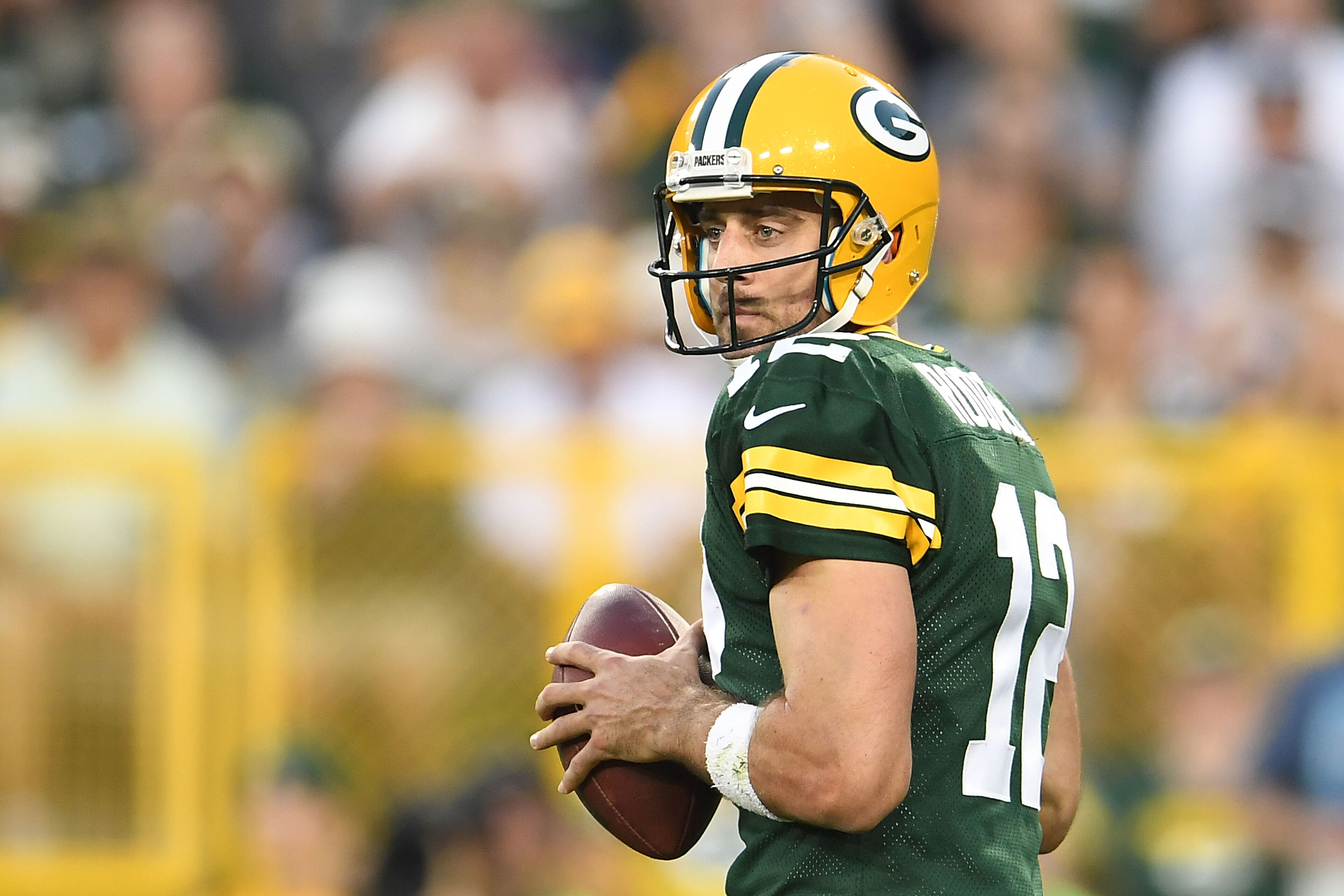 GREEN BAY, WI - SEPTEMBER 24:  Aaron Rodgers #12 of the Green Bay Packers drops back to pass during a game against the Cincinnati Bengals at Lambeau Field on September 24, 2017 in Green Bay, Wisconsin.  The Packers defeated the Bengals in overtime 27-24. 