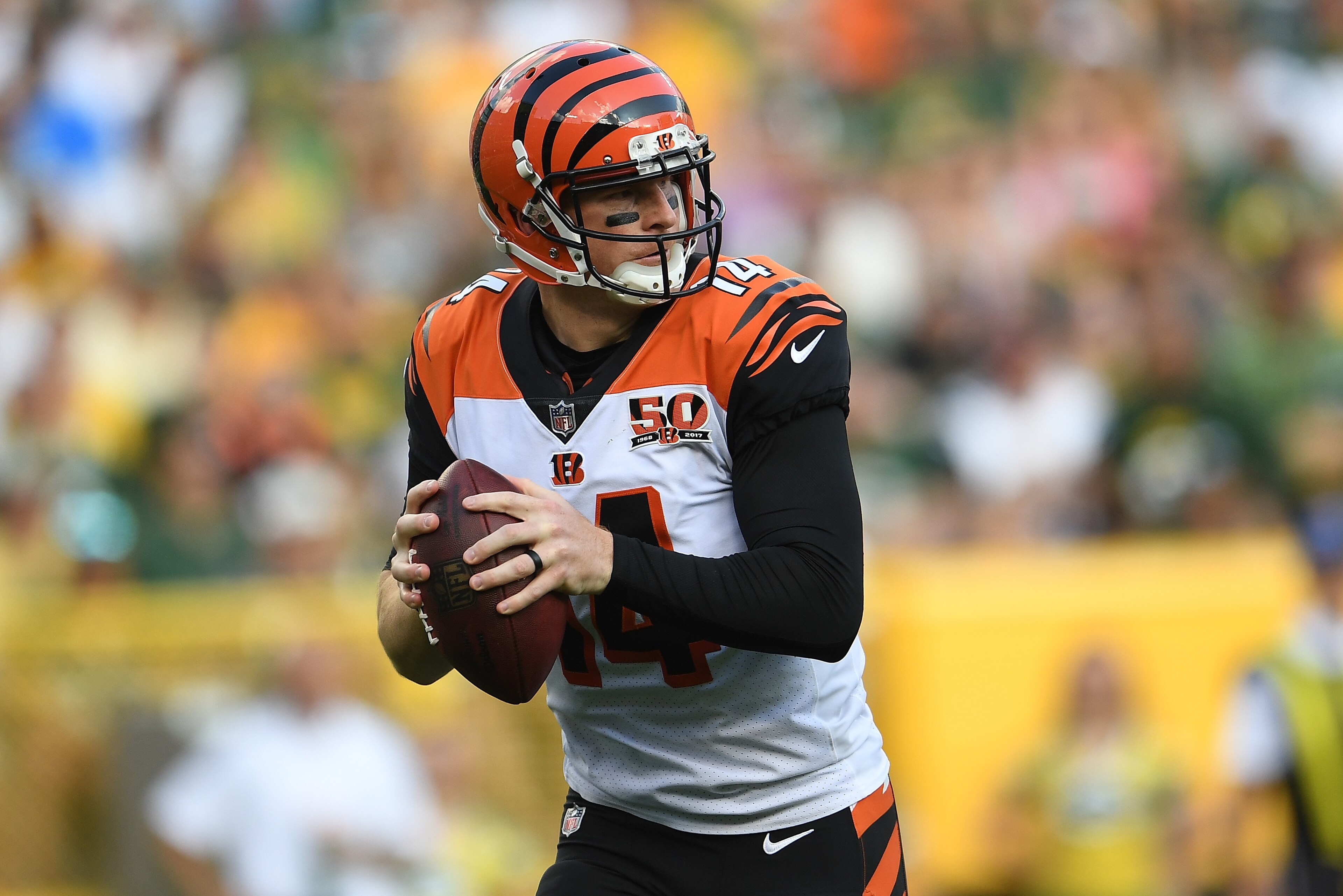 GREEN BAY, WI - SEPTEMBER 24:  Andy Dalton #14 of the Cincinnati Bengals drops back to pass during the second quarter against the Green Bay Packers at Lambeau Field on September 24, 2017 in Green Bay, Wisconsin.  (Photo by Stacy Revere/Getty Images)