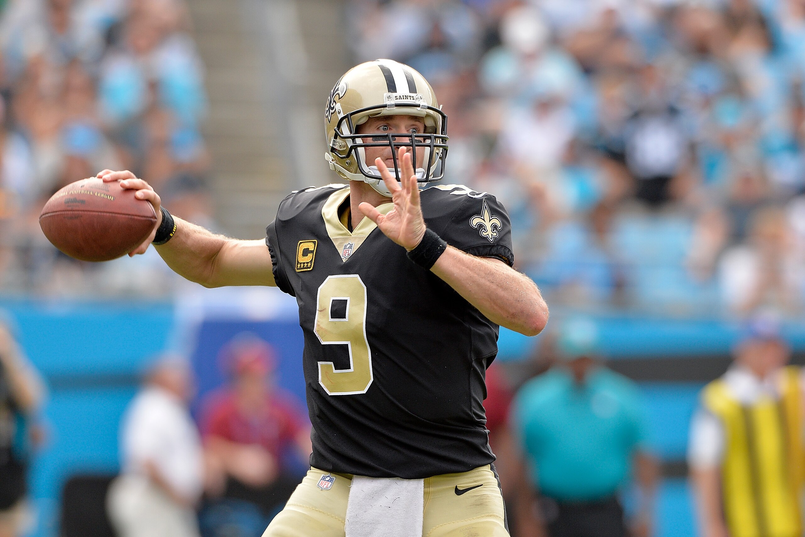 CHARLOTTE, NC - SEPTEMBER 24:  Drew Brees #9 of the New Orleans Saints drops back to pass against the Carolina Panthers during their game at Bank of America Stadium on September 24, 2017 in Charlotte, North Carolina.  (Photo by Grant Halverson/Getty Image